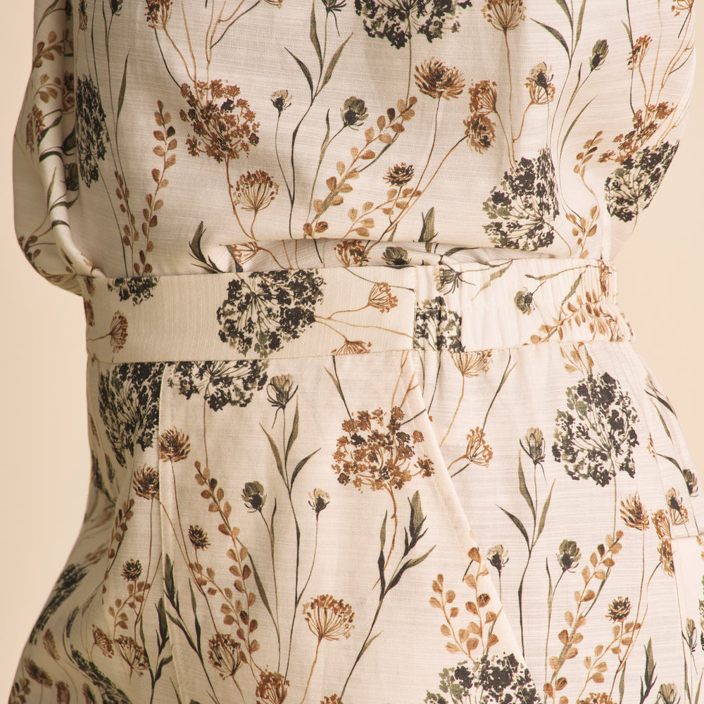 Floral patterned dress with a neutral background