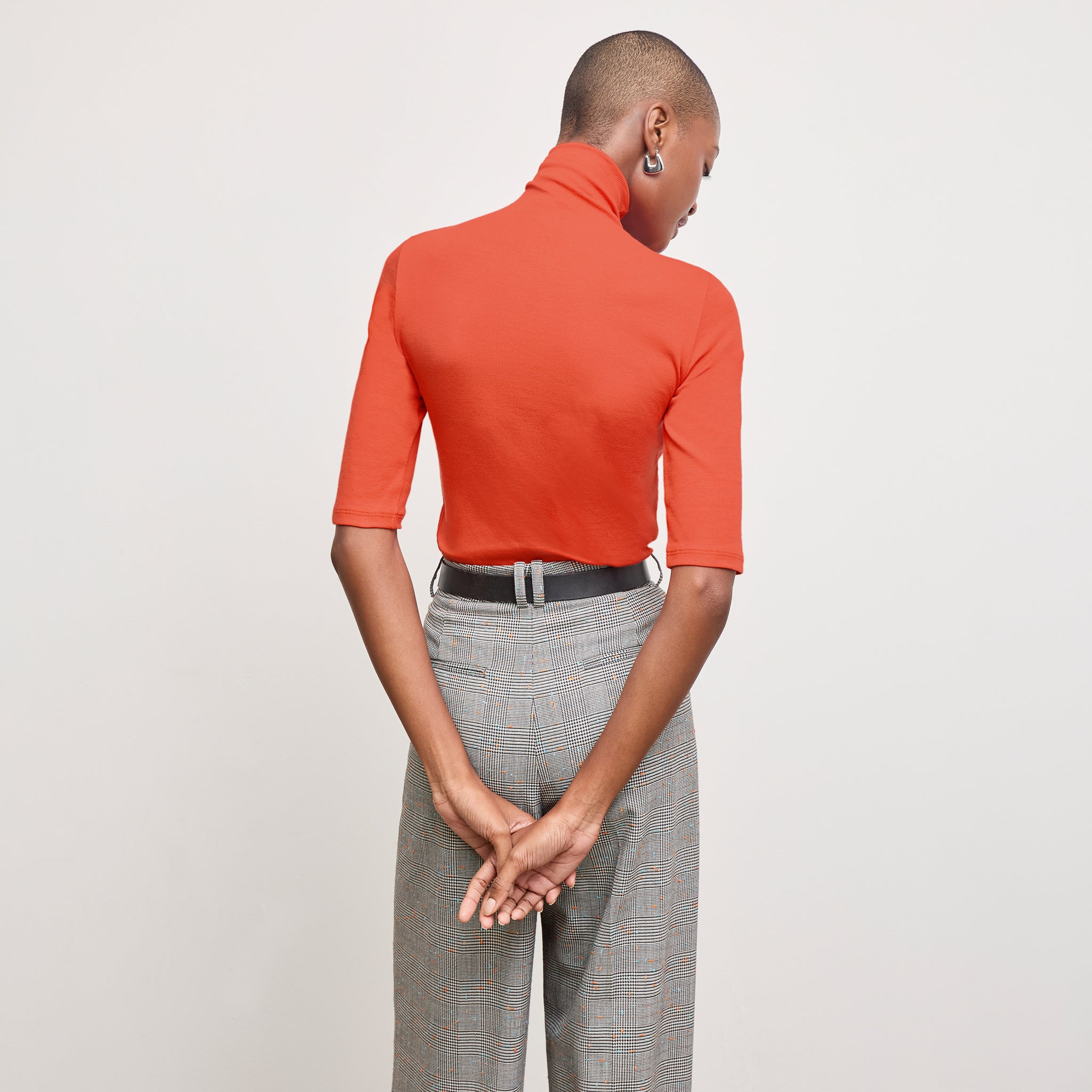 back image of a woman wearing the jax shirt in marmalade