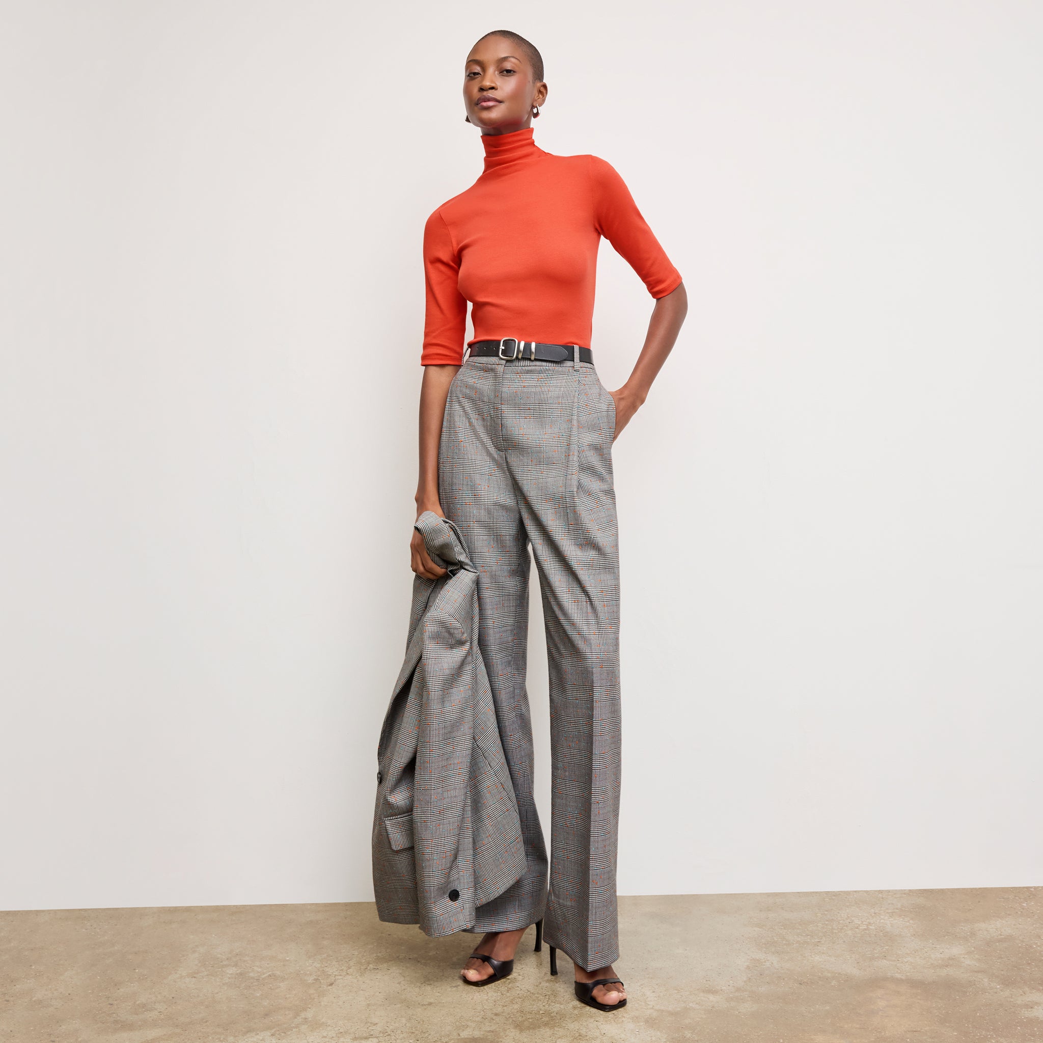 front image of a woman wearing the jax shirt in marmalade