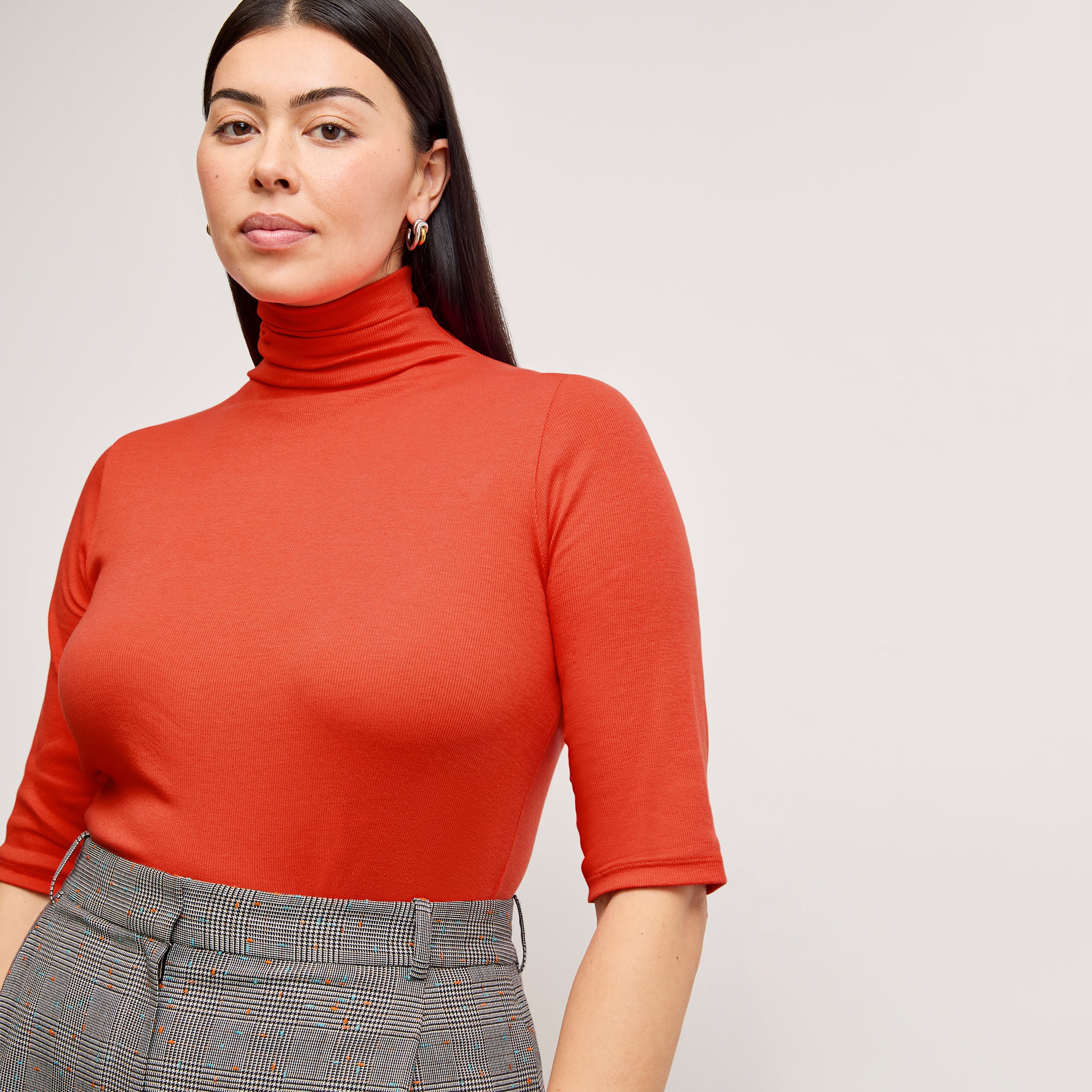 front image of a woman wearing the jax shirt in marmalade