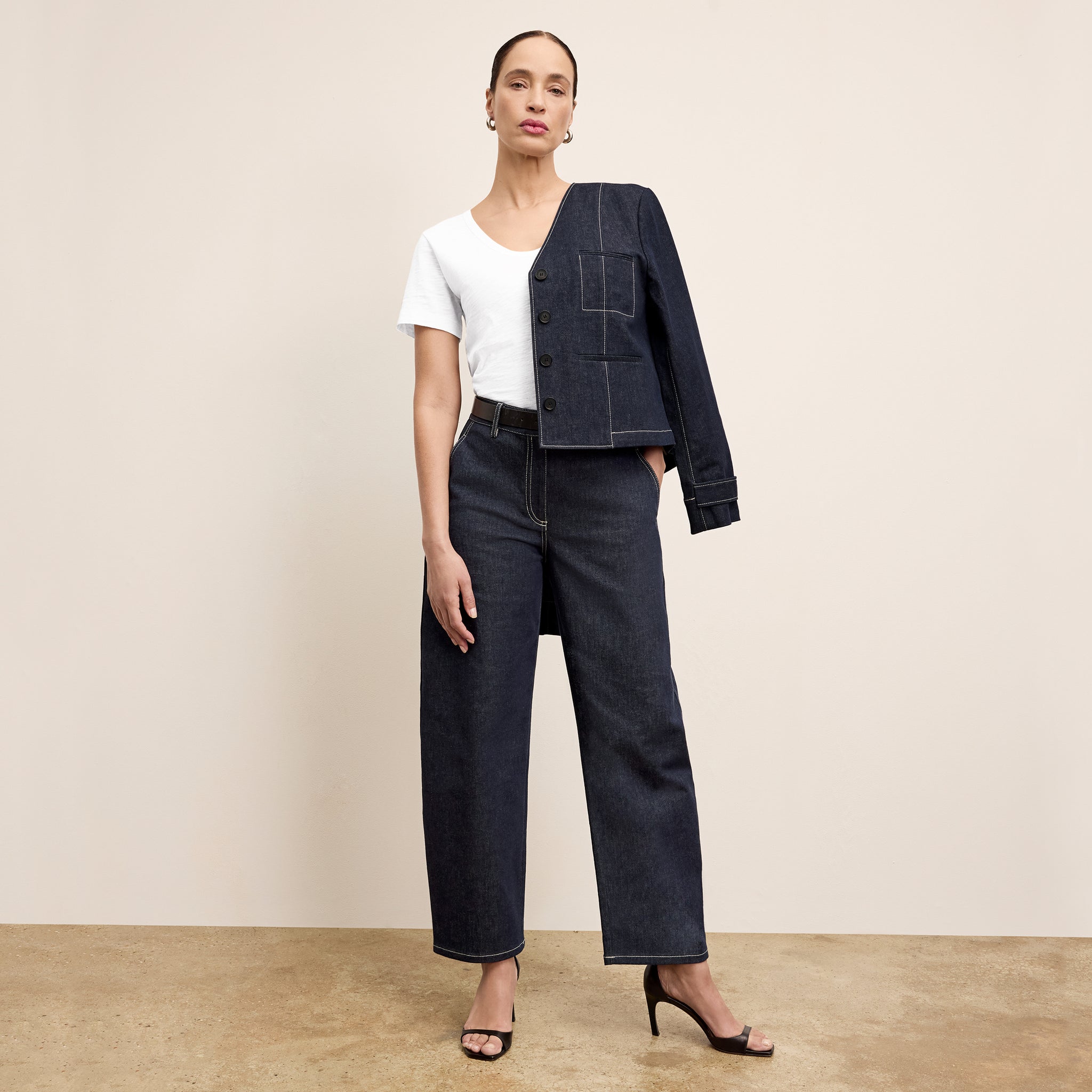 front image of a woman wearing the bari jean in midnight wash