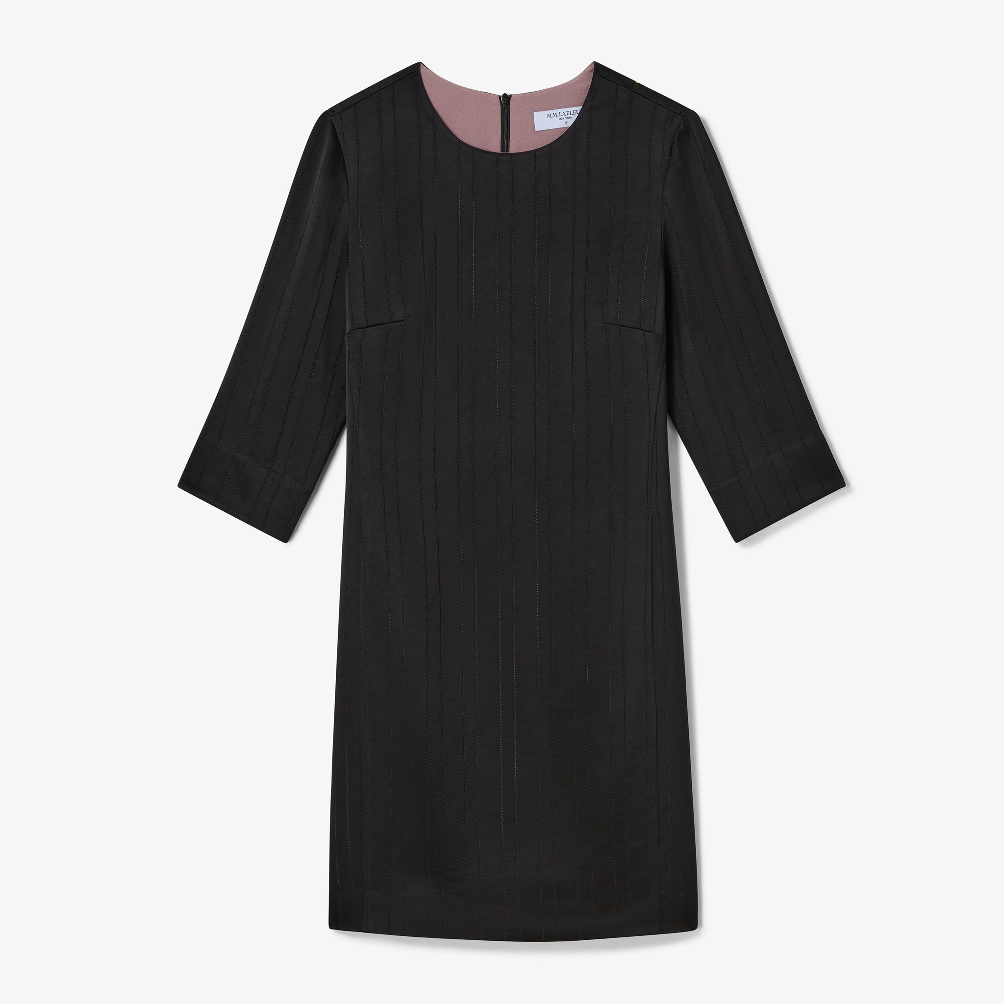 Black dress with pink lining on a white background