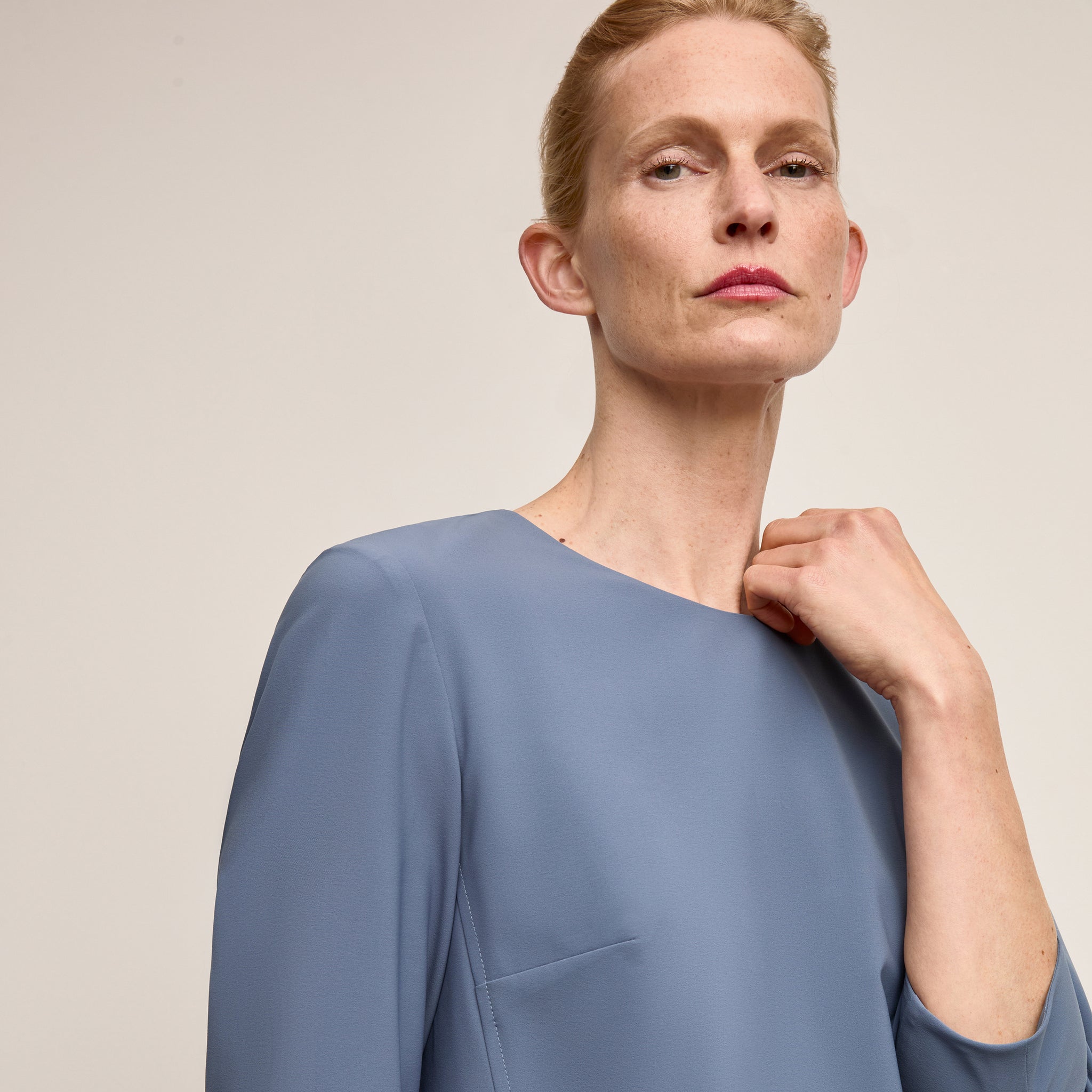 Front image of a woman wearing Lancia Dress Origamitech Dusty Blue