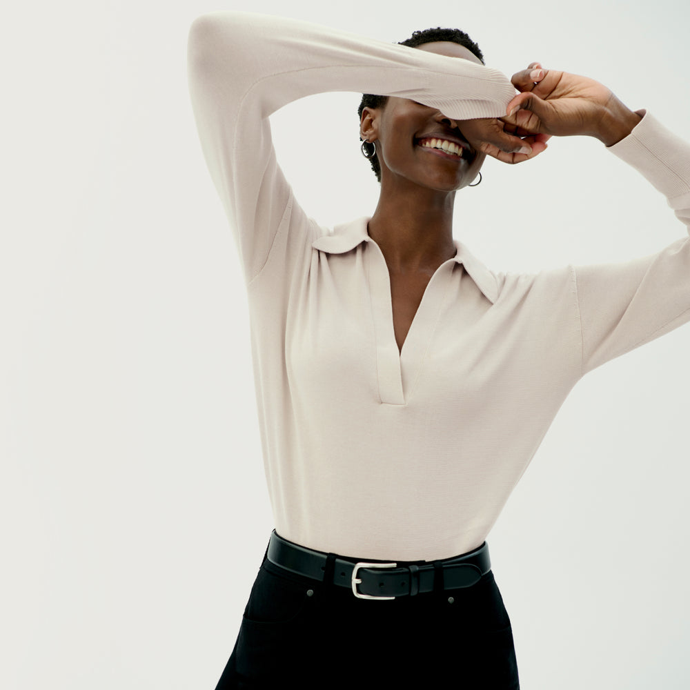 Front image of a woman wearing the Leo Pullover