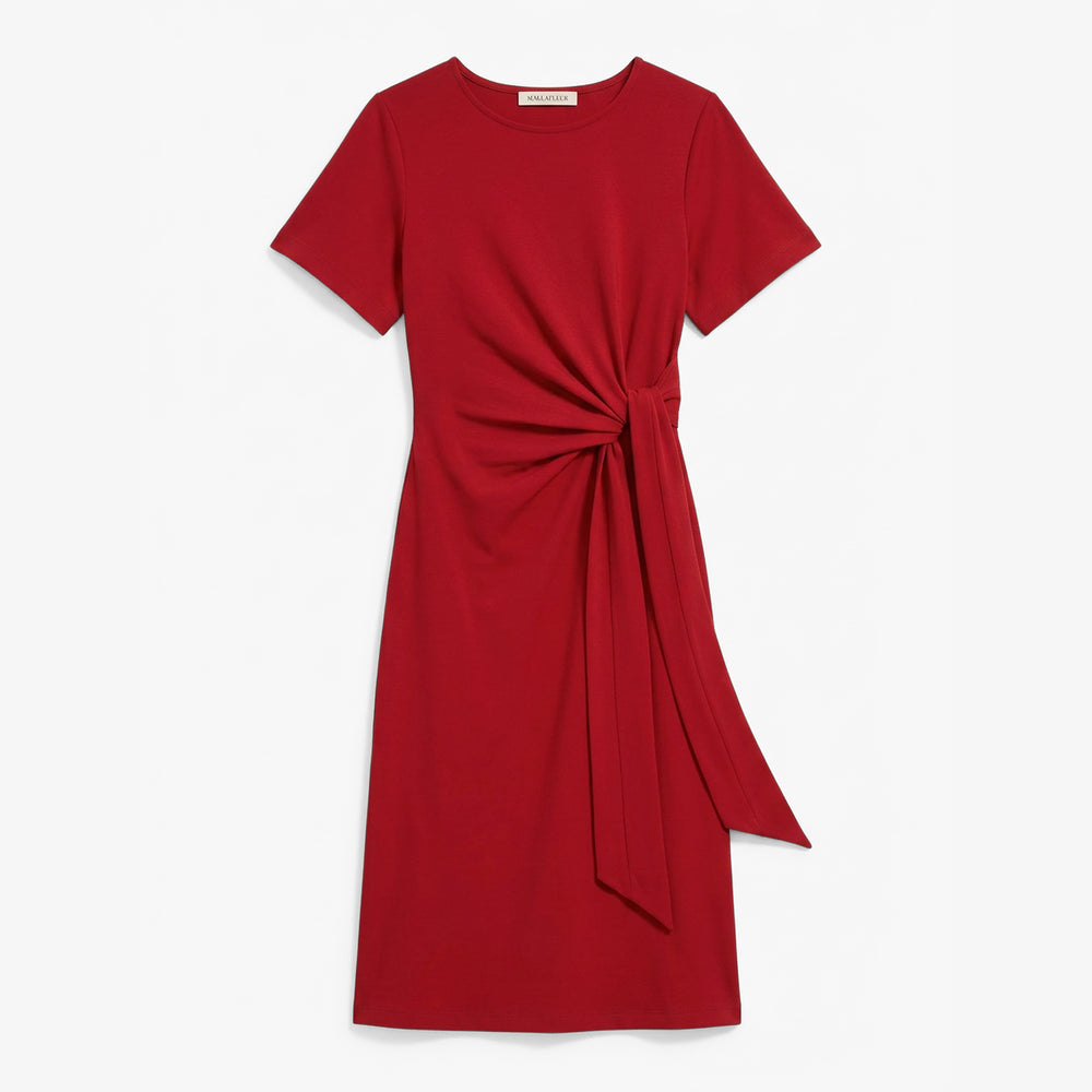 Red dress with a knot detail on a white background