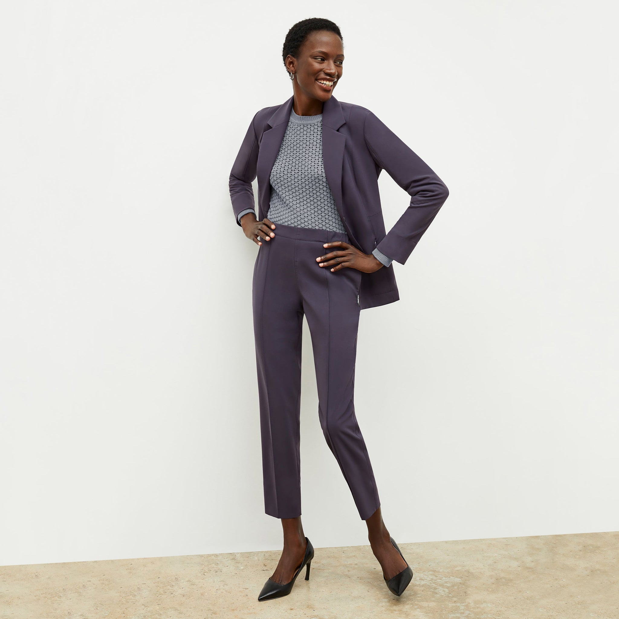 Front image of a woman standing sitting the Colby Jogger in Cool Charcoal 