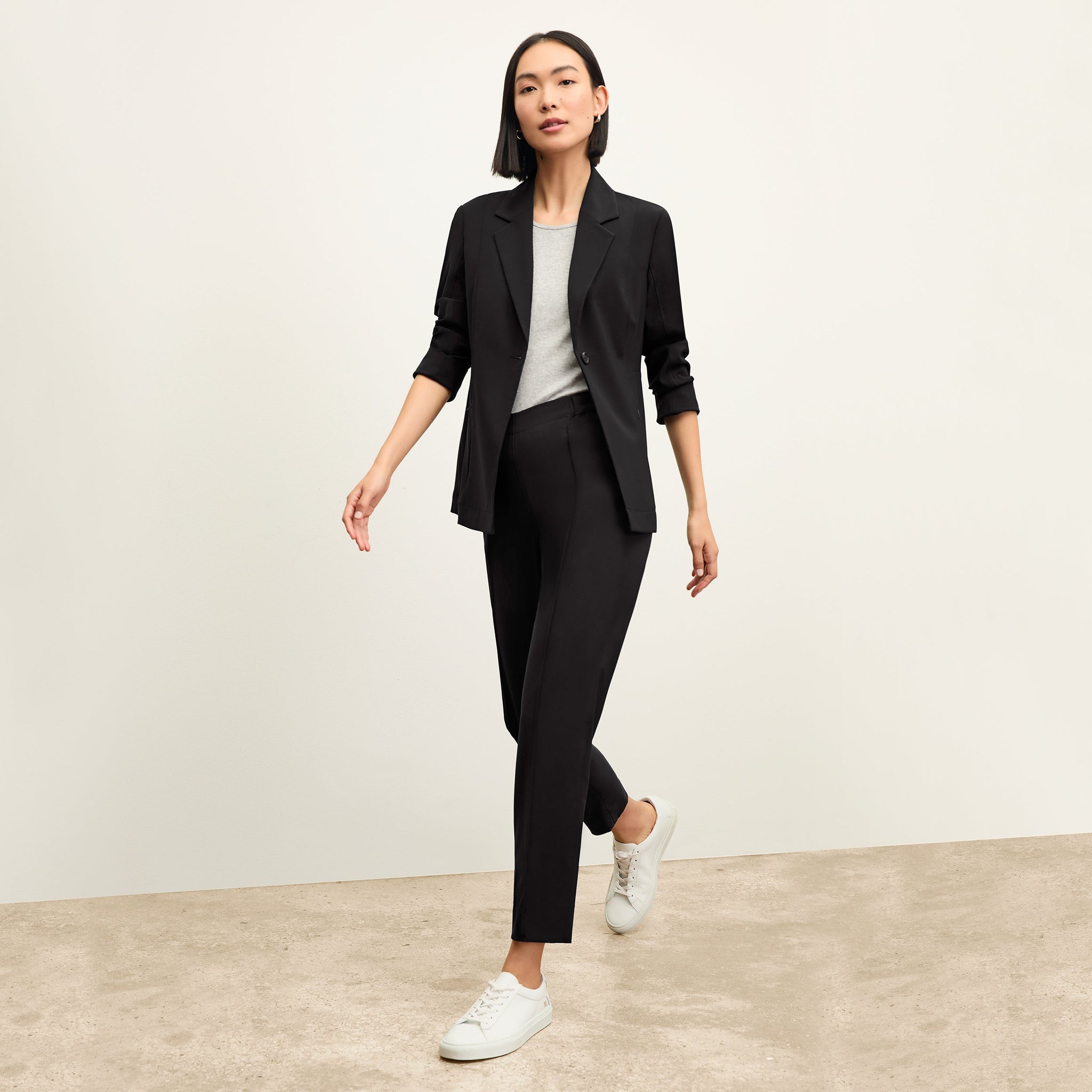 Front image of a woman standing wearing the Colby Jogger in Black