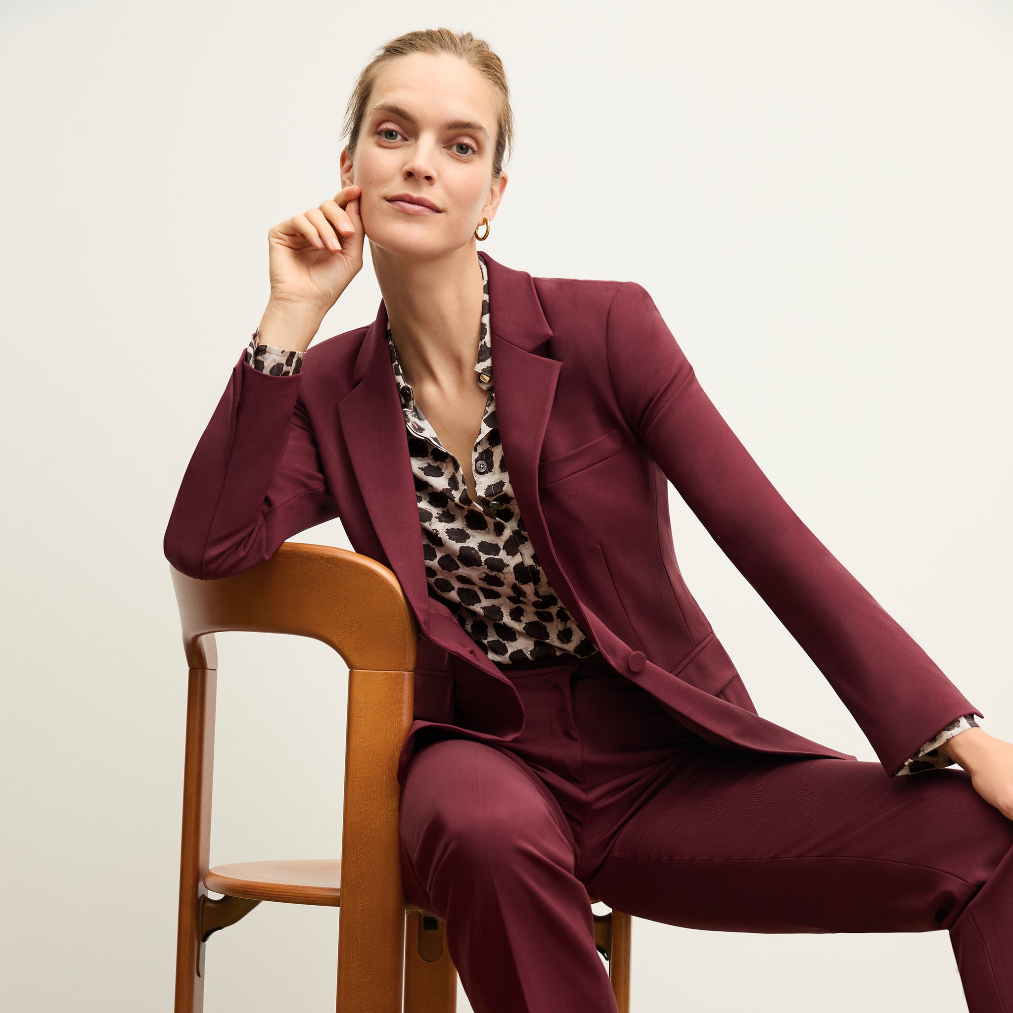 Front image of a woman wearing the tatum shirt in sahara print