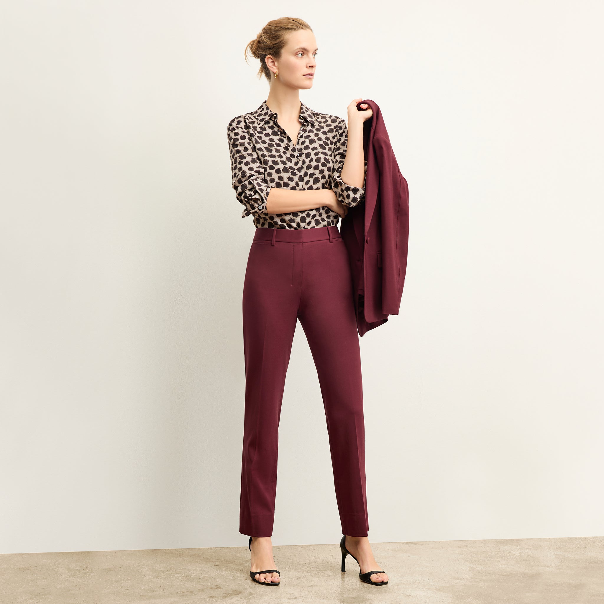 Front image of a woman wearing the tatum shirt in sahara print