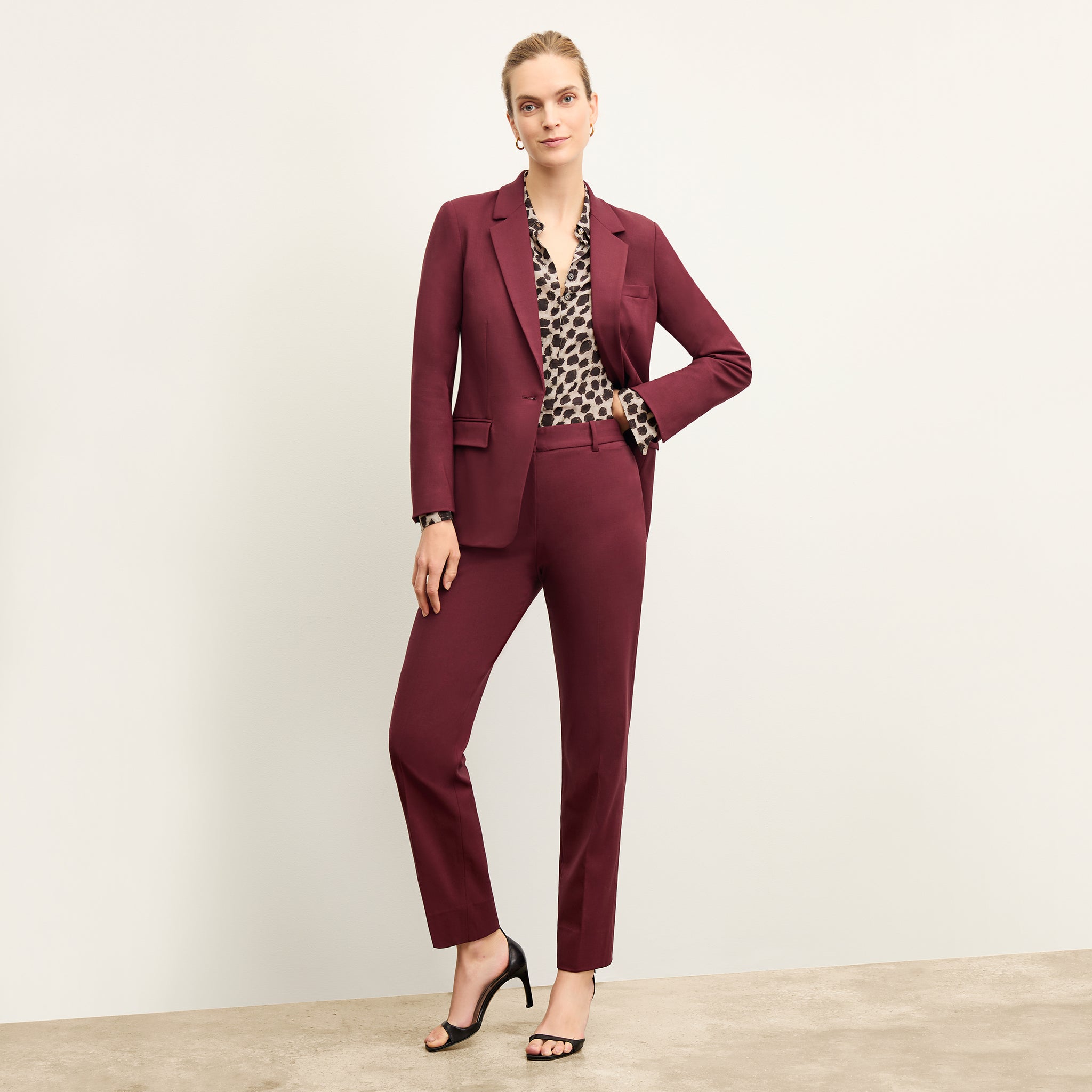 Front image of a woman wearing the tatum shirt in sahara print 