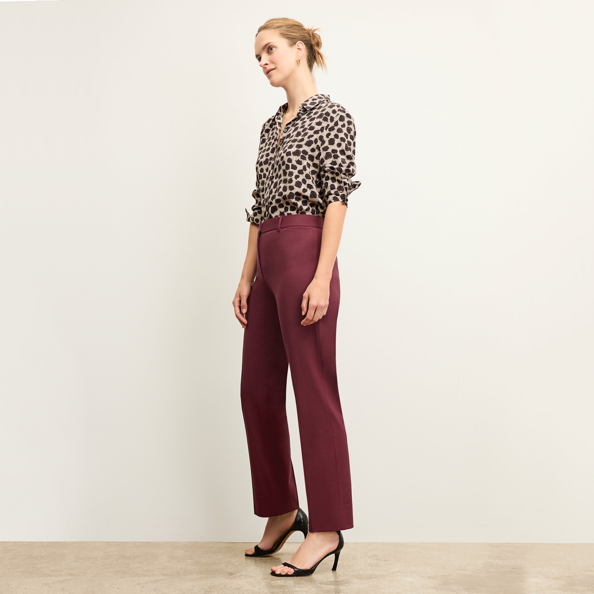 Front image of a woman wearing the tatum shirt in sahara print 
