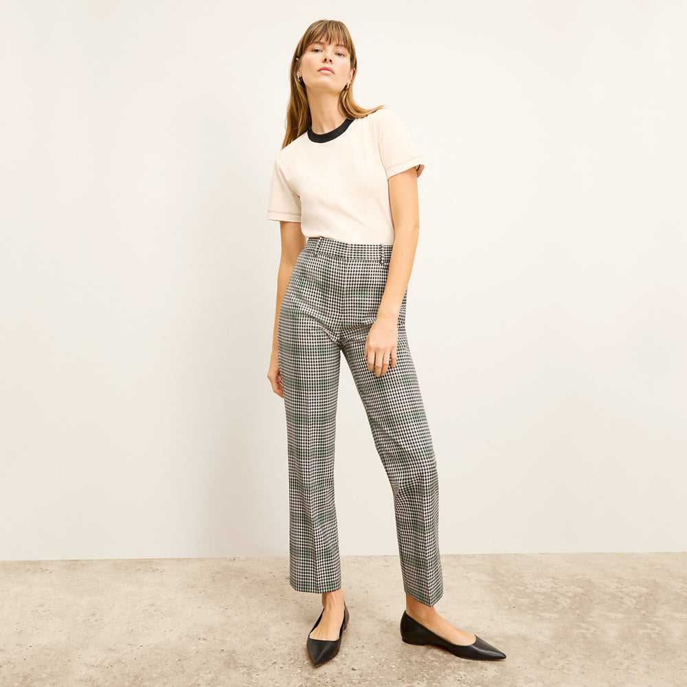 front image of a woman wearing the smith pant in check plaid