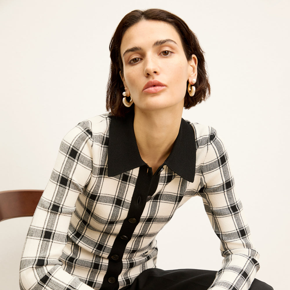 Front image of a woman wearing the Lacie top