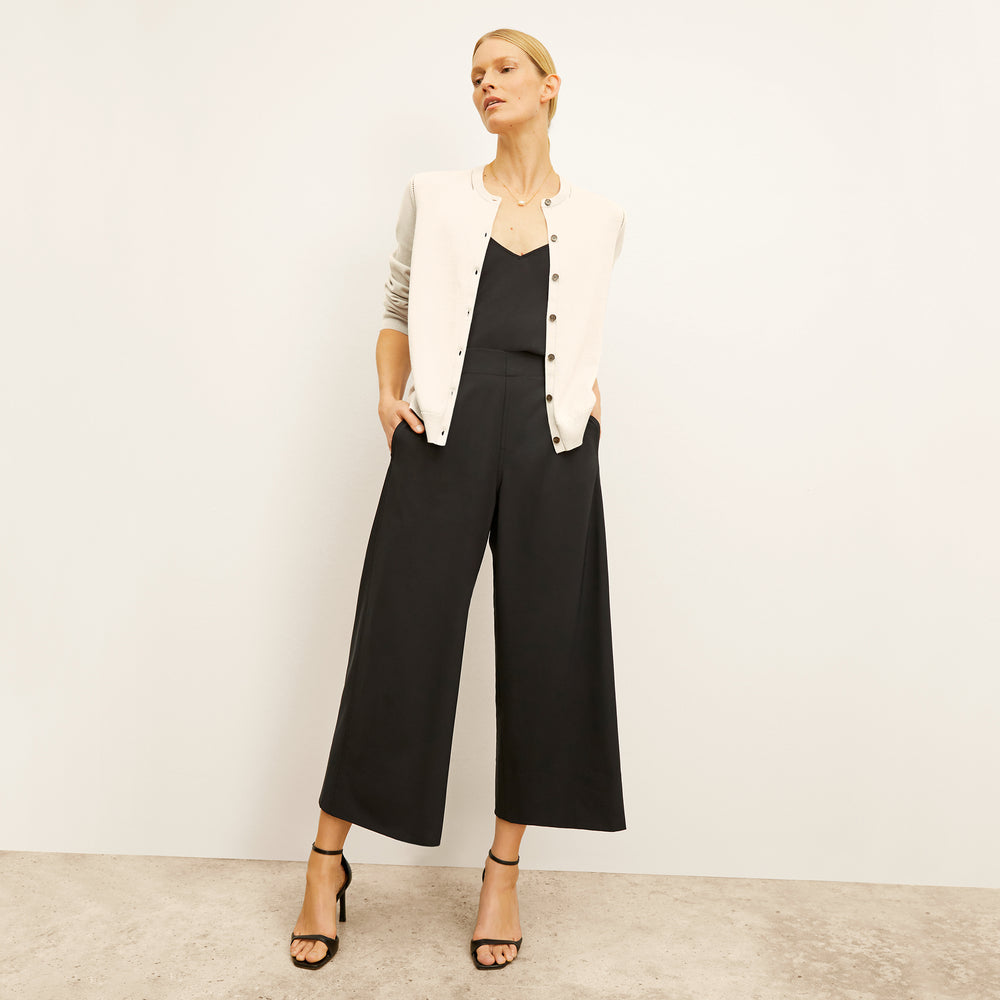 front image of a woman wearing the elena pants in black