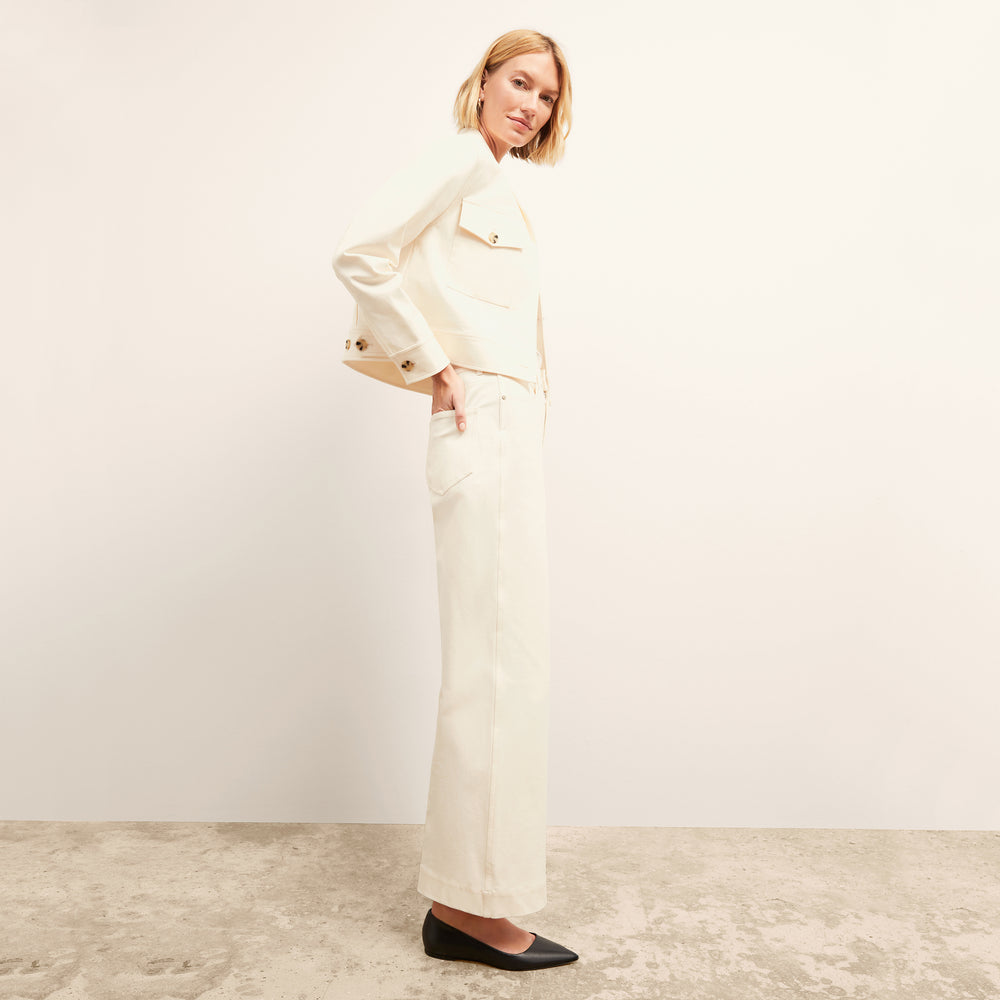 front image of a woman wearing the rhoda jacket in tusk