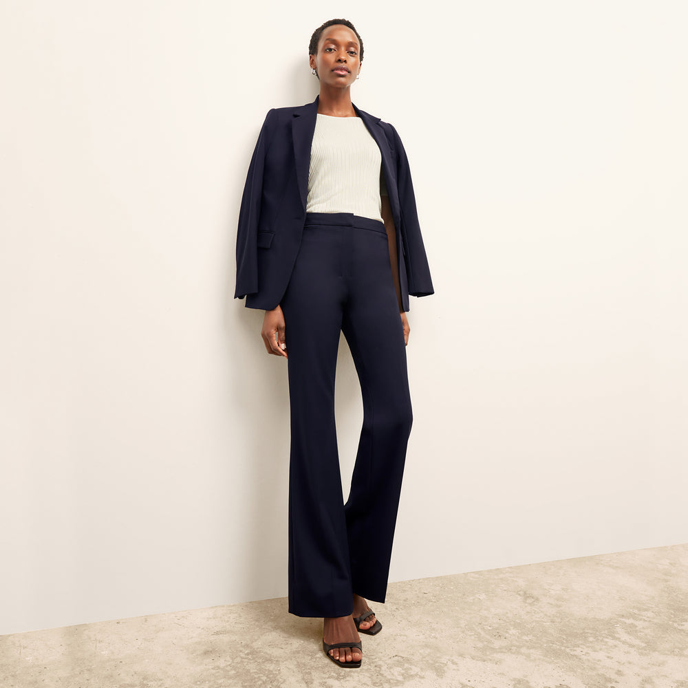 front image of a woman wearing the charlie top in ivory