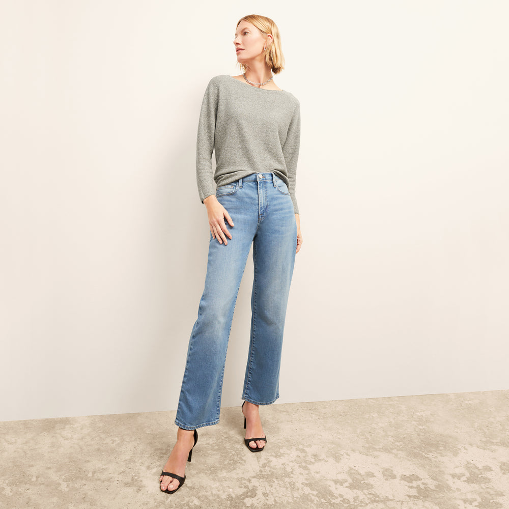 front image of a woman wearing the chadwick sweater in olive melange