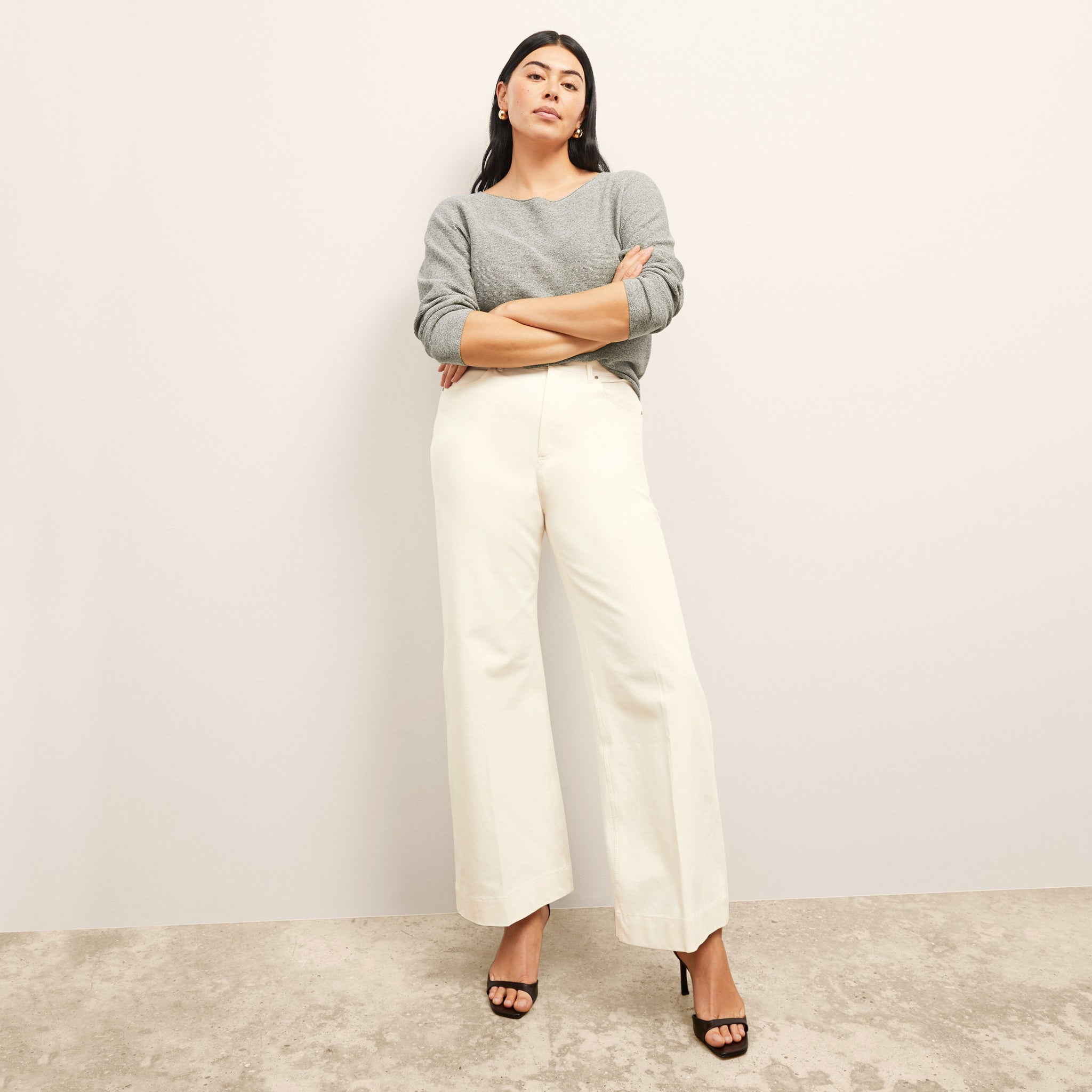 Front image of a woman wearing the Milo Jean in Tusk