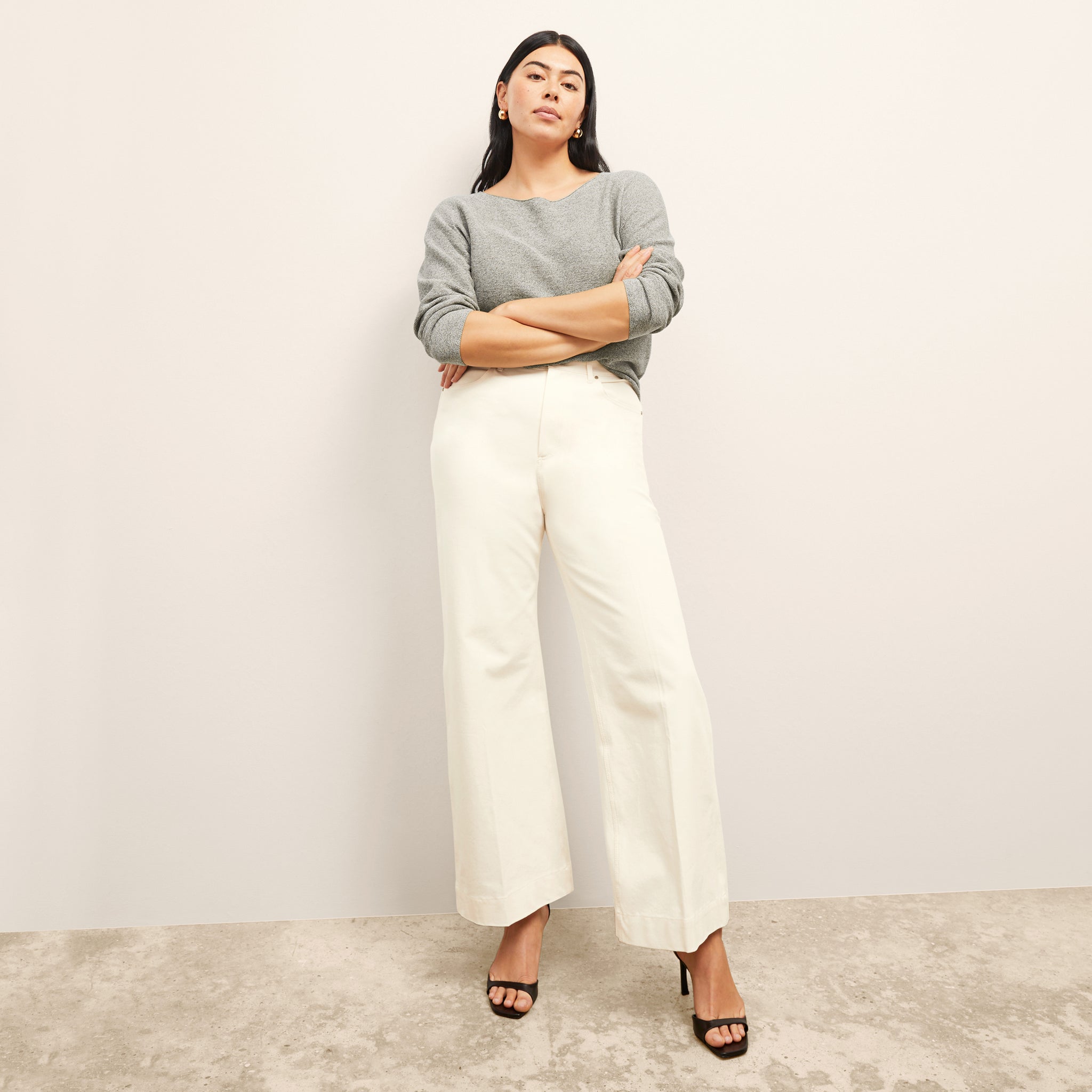 Front image of a woman wearing the Milo Jean in Tusk