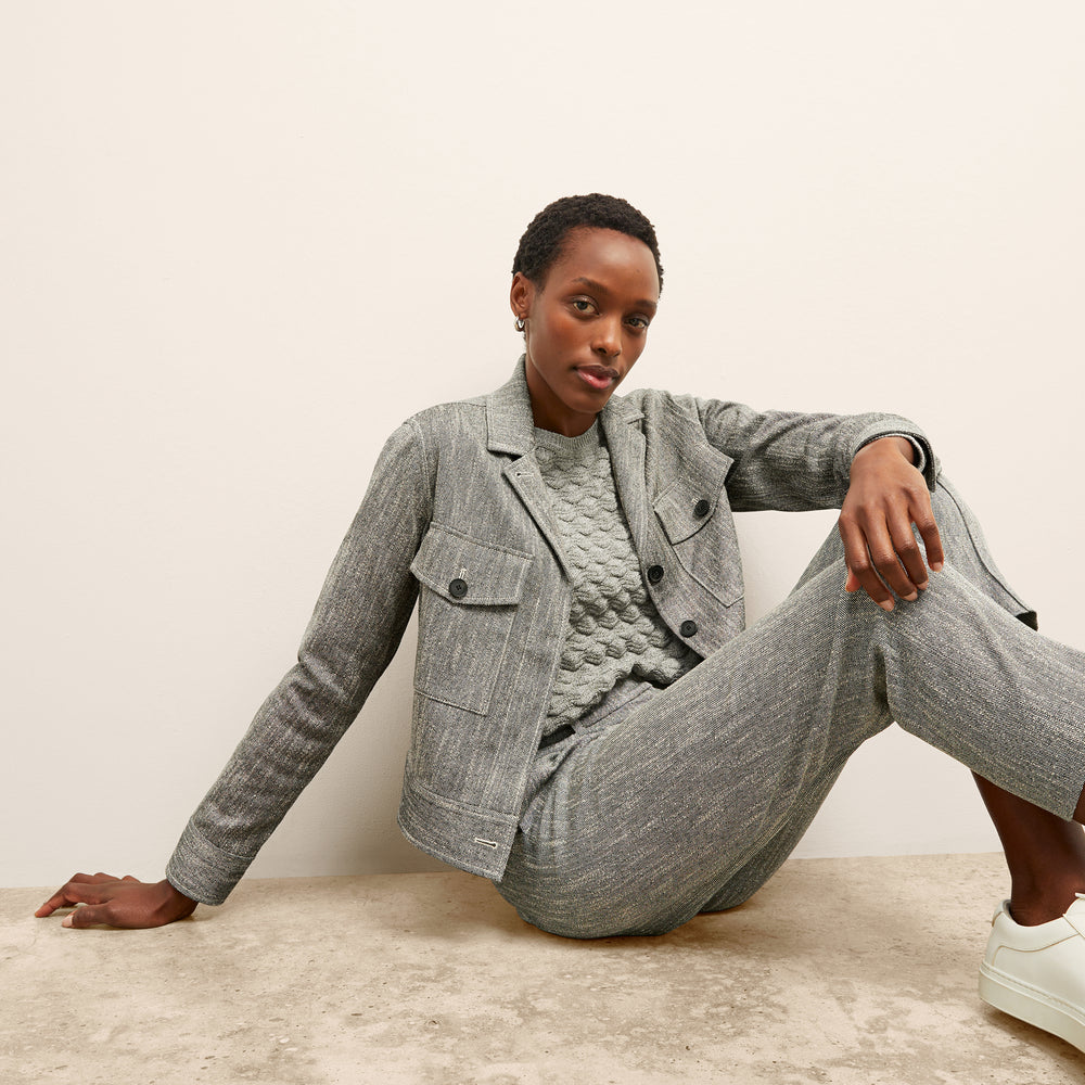 front image of a woman wearing the pearl pant in black/ivory