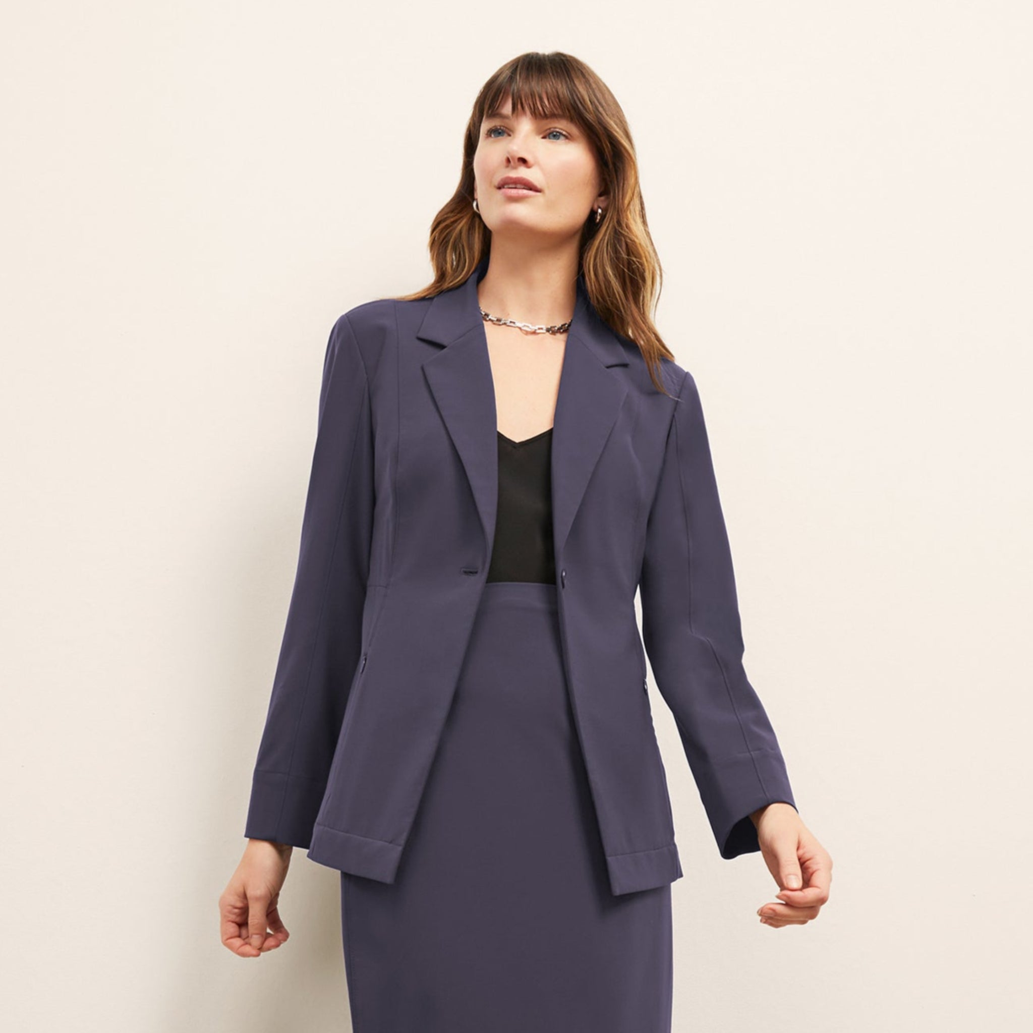 Front image of a woman wearing the Cobble Hill Skirt - OrigamiTech in Cool Charcoal 