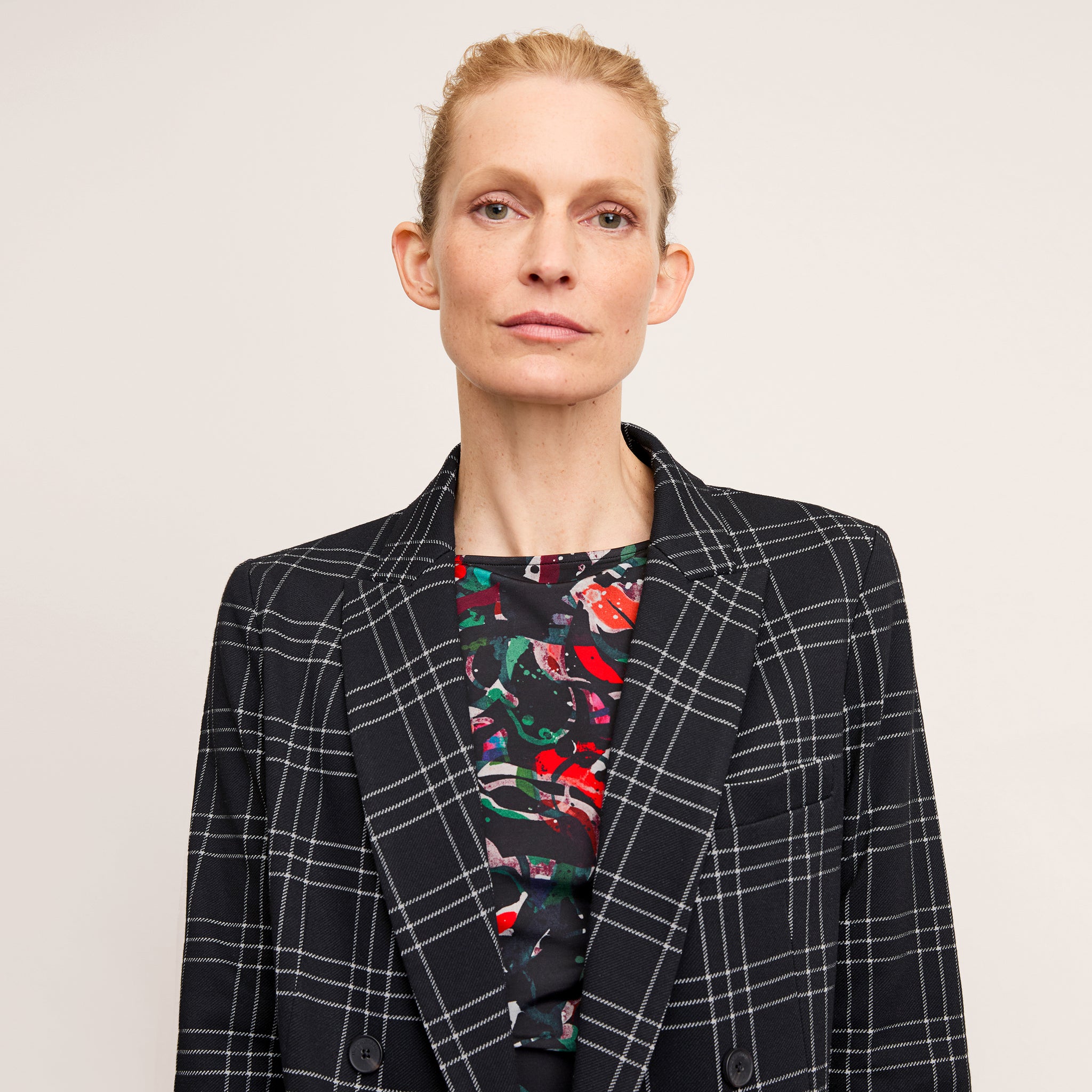 front image of a woman wearing the percy top in splatter pop