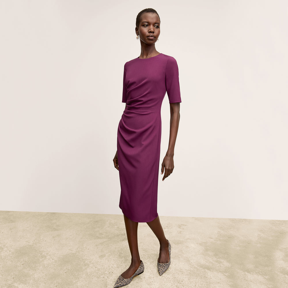 front image of a woman wearing the ciela dress in plumberry