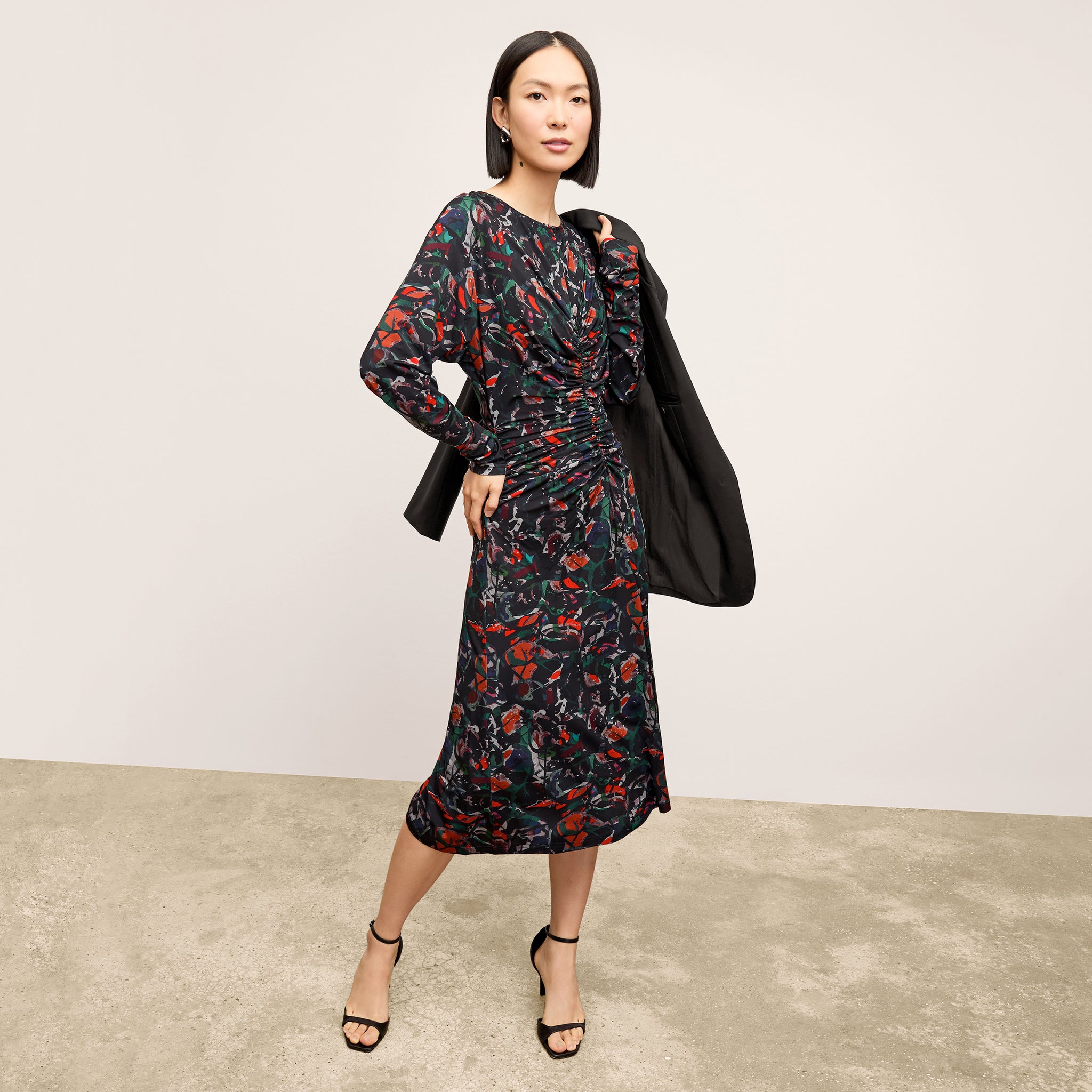 front image of a woman wearing the johnna dress in splatter pop