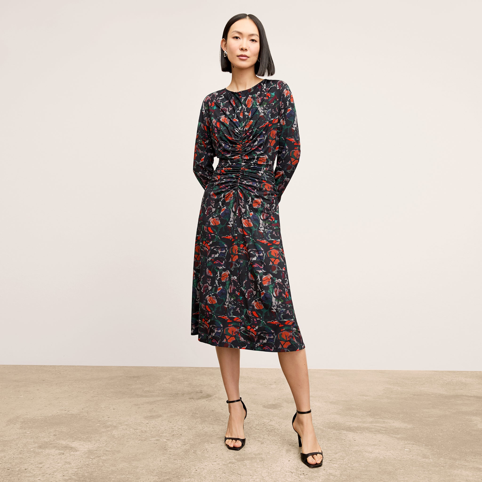 front image of a woman wearing the johnna dress in splatter pop 