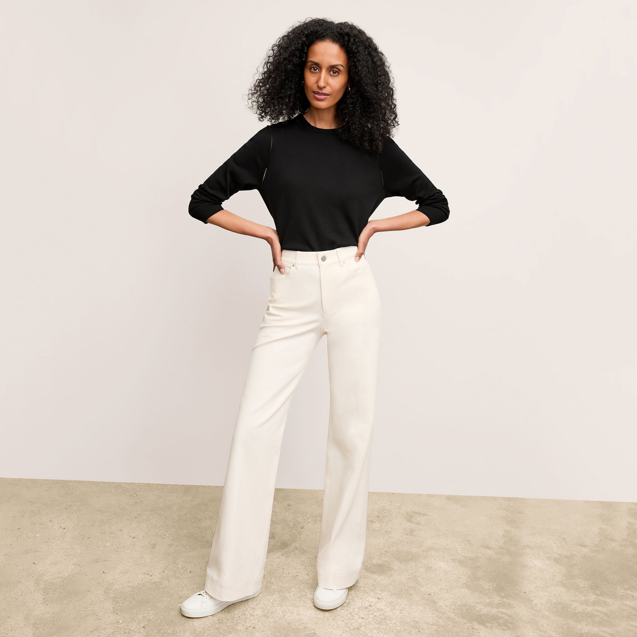 Front image of a woman wearing the Milo Jean in Bright Ivory 