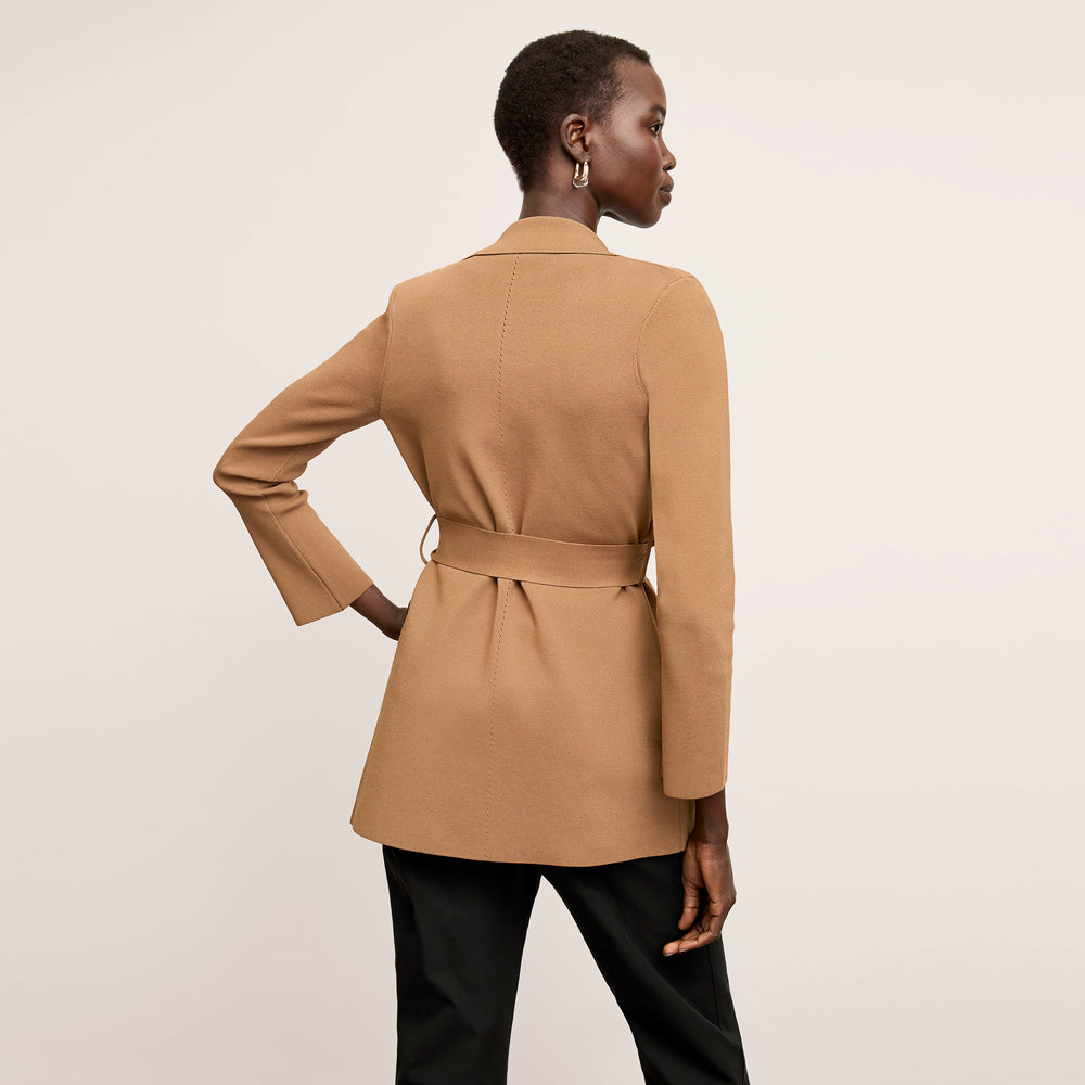 back image of a woman wearing the merritt jardigan in saddle