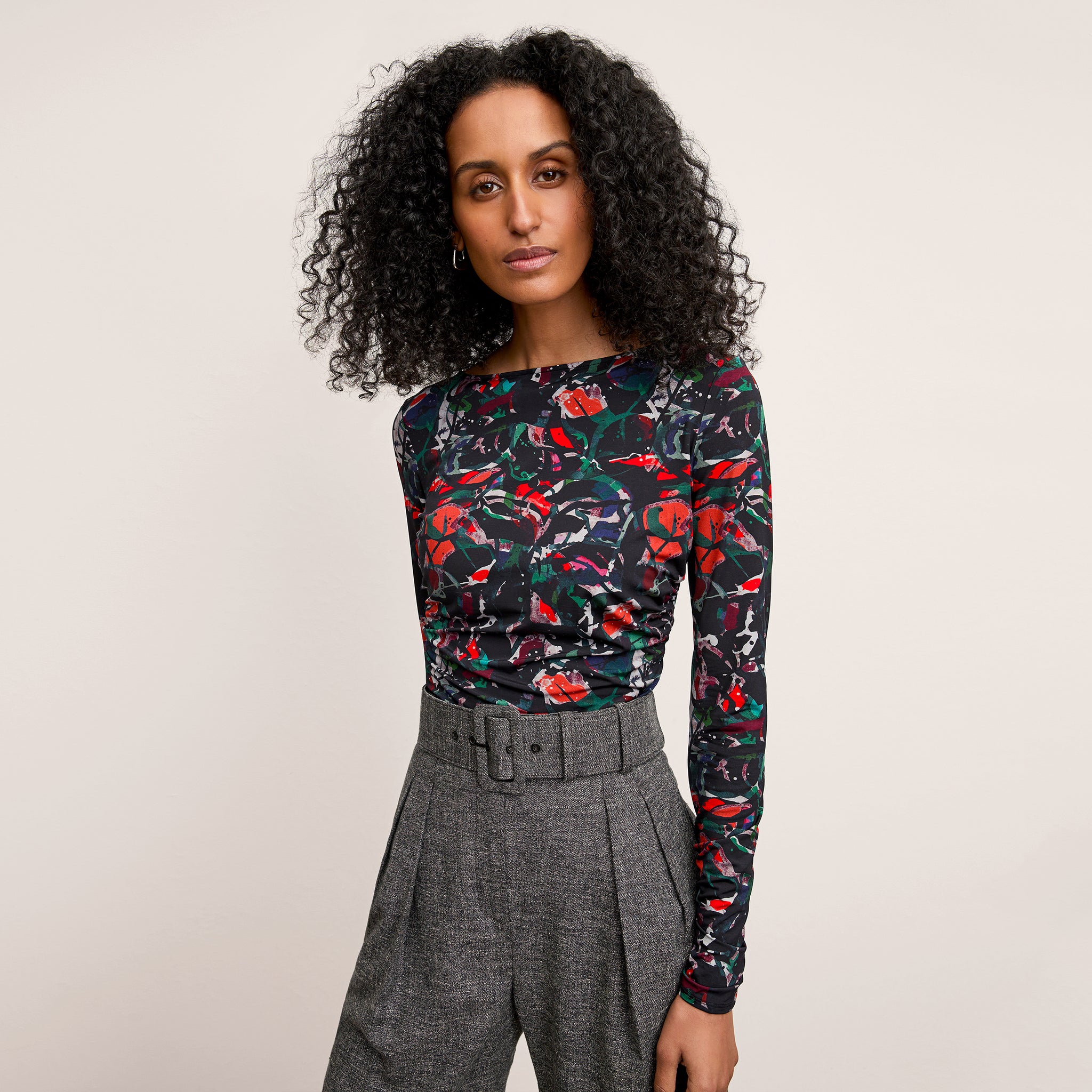 front image of a woman wearing the percy top in splatter pop 