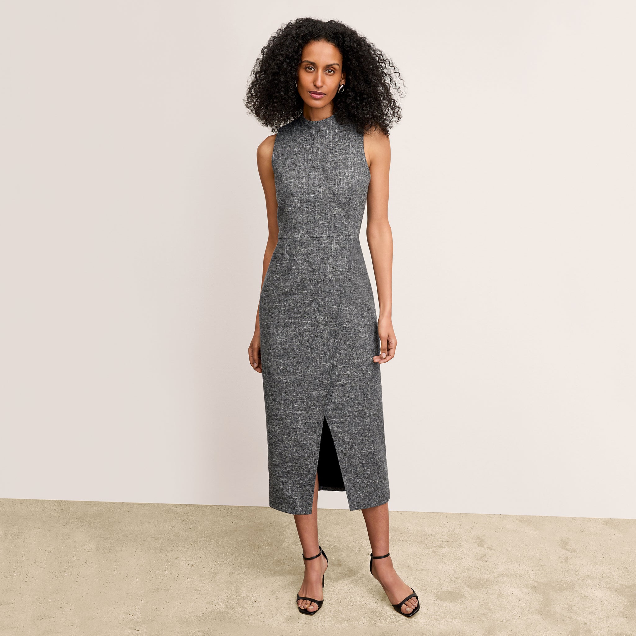 front image of a woman wearing the valencia dress in black/white 