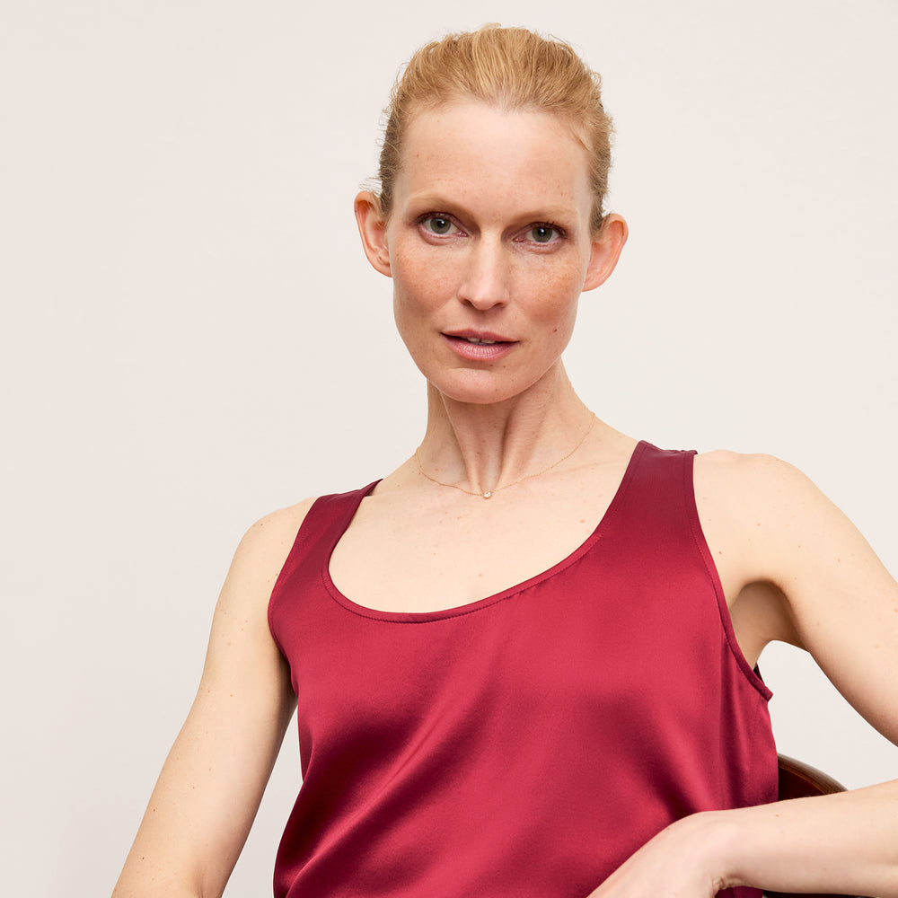 Front image of a woman wearing the Vicky Tank in Washable Silk Charmeuse in Scarlet