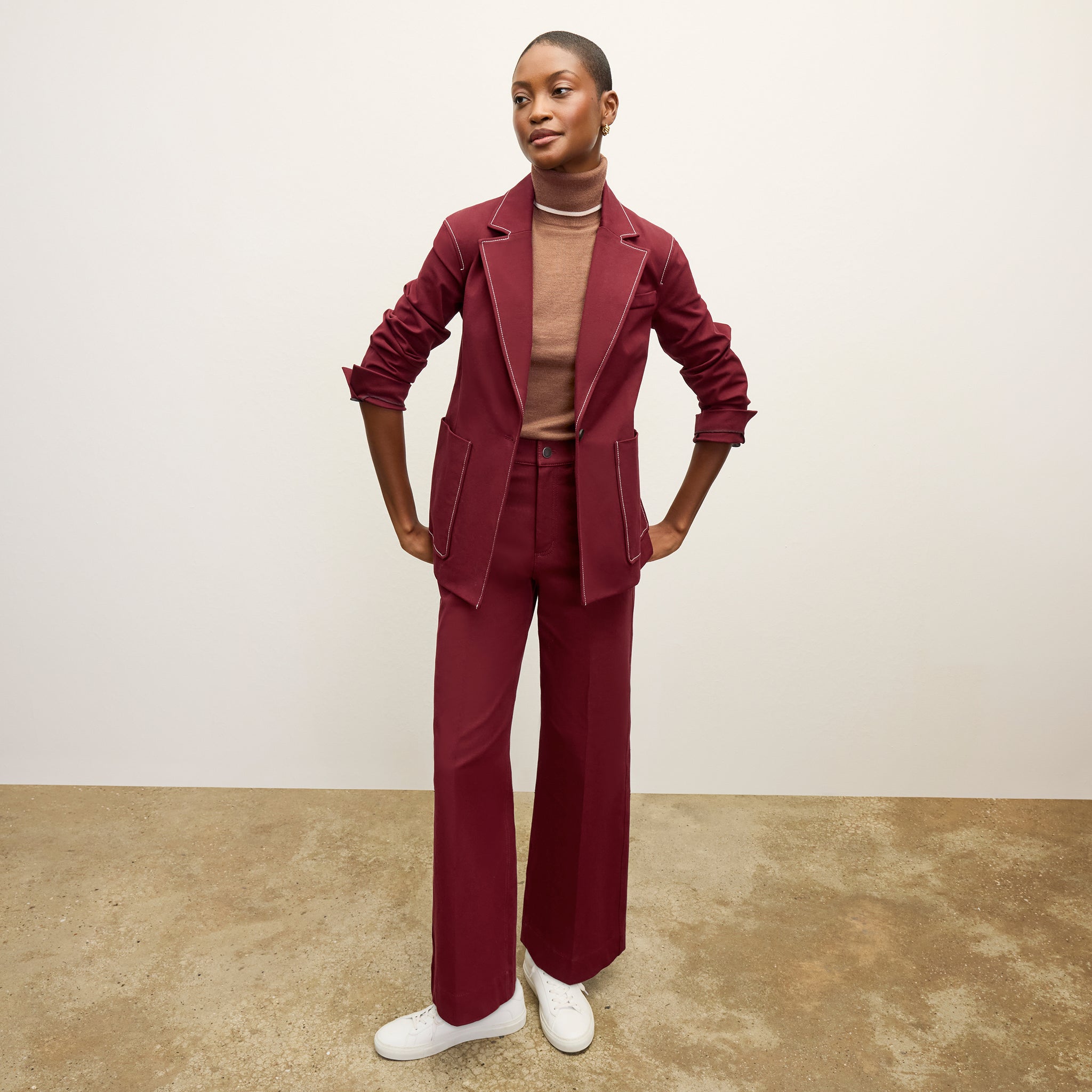 front image of a woman wearing the milo jean in berry jam