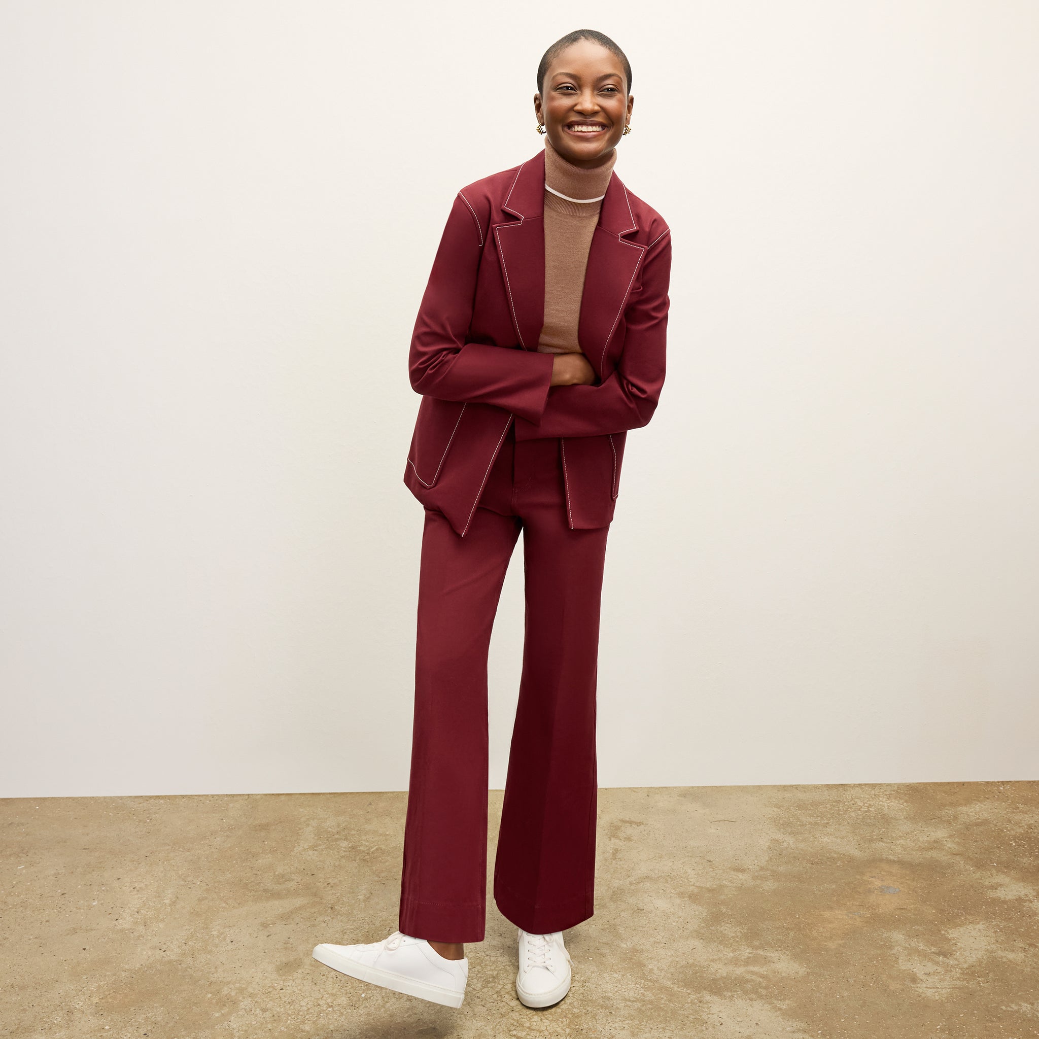 front image of a woman wearing the milo jean in berry jam