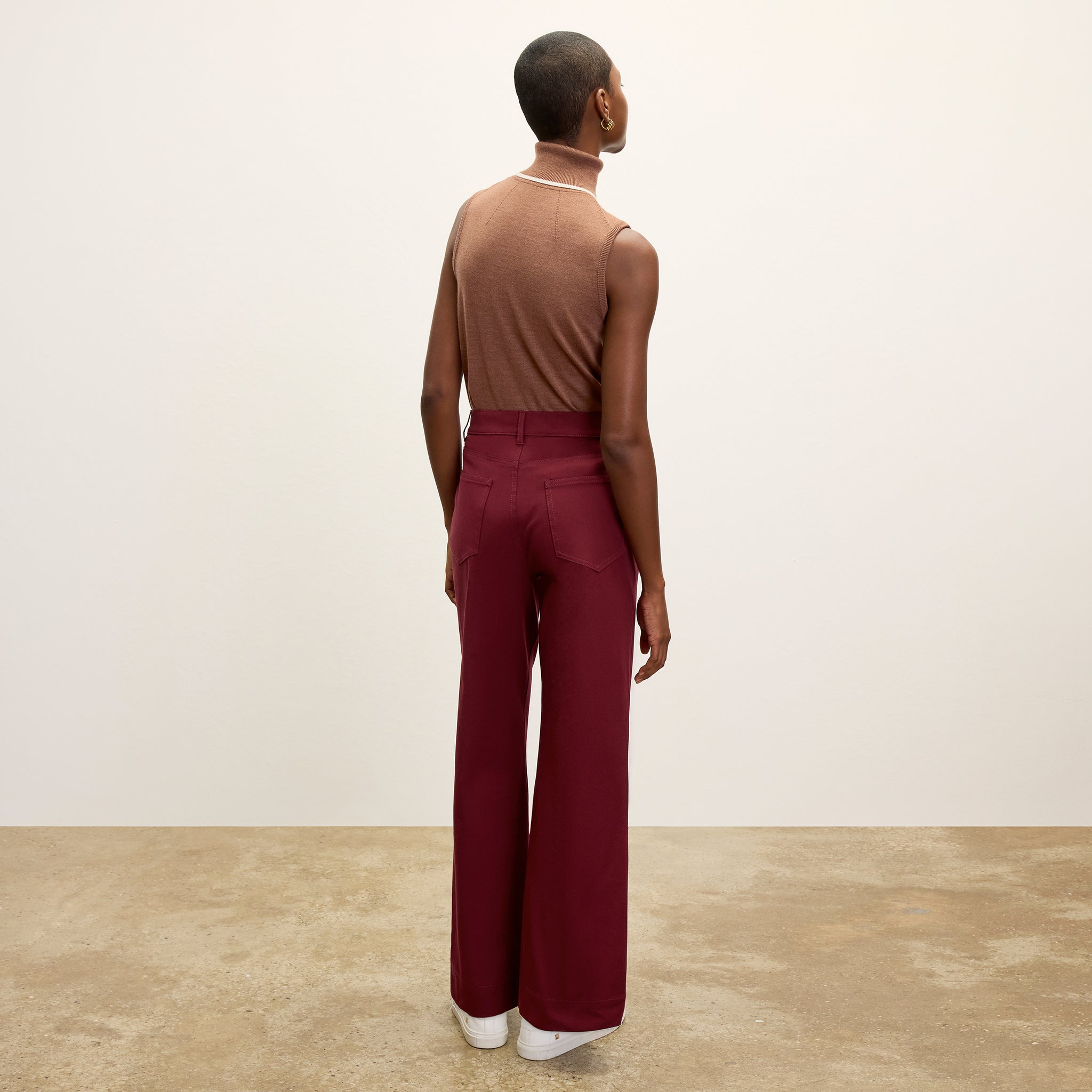 back image of a woman wearing the milo jean in berry jam