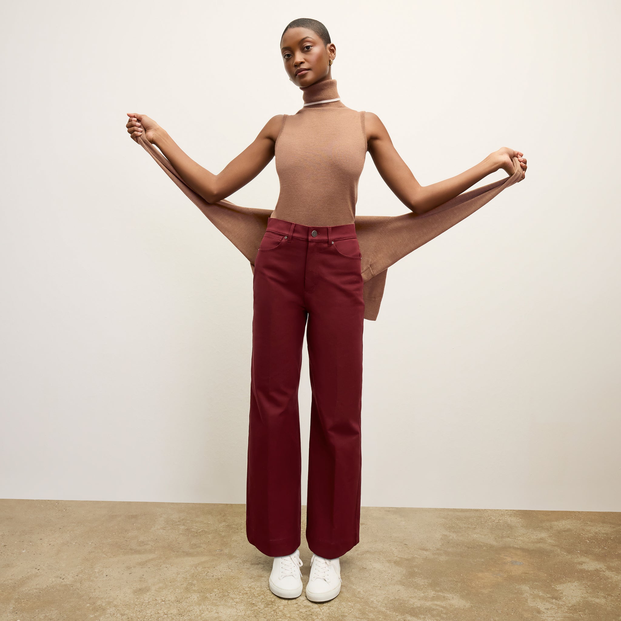 front image of a woman wearing the milo jean in berry jam