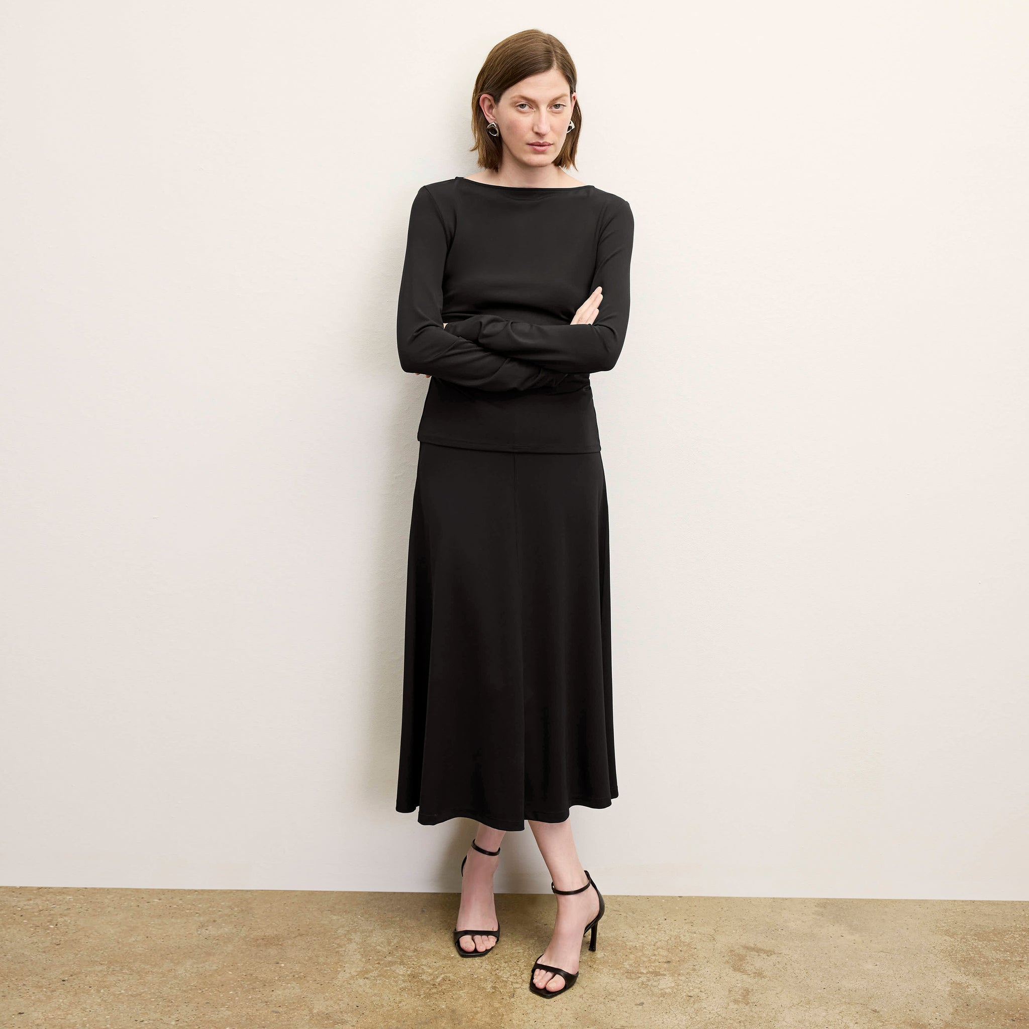 front image of a woman wearing the percy top in black