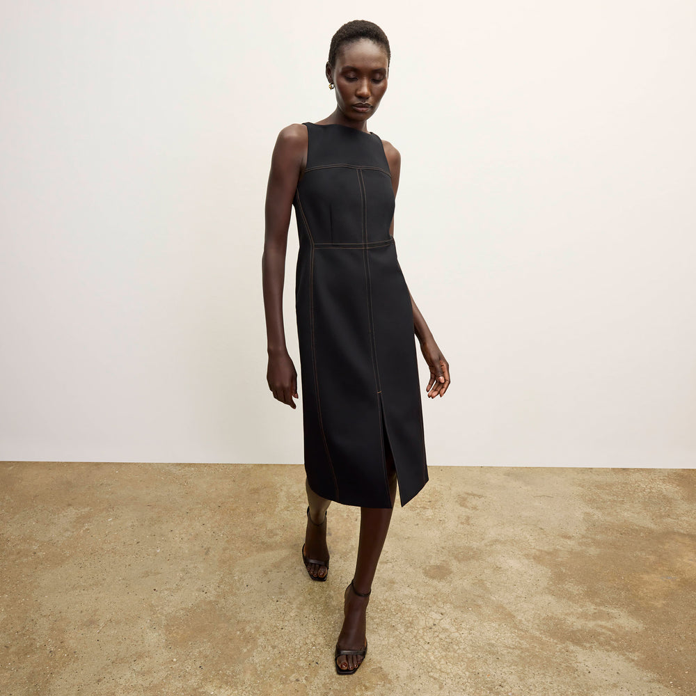 front image of a woman wearing the issa dress in black/light saddle