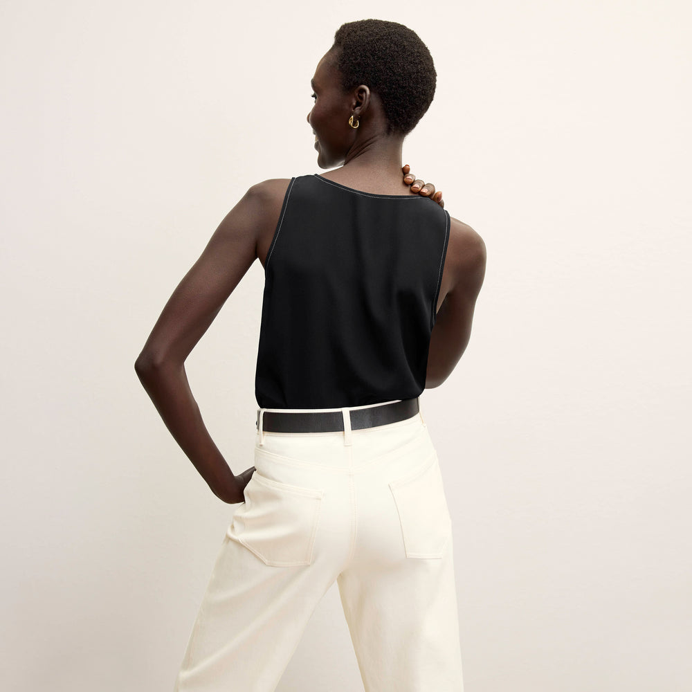 back image of a woman wearing the vicky tank in black