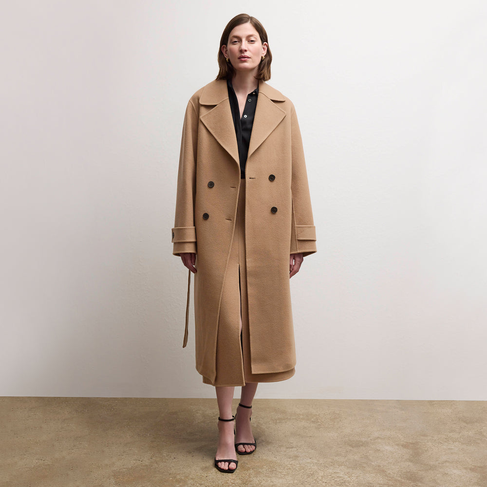 front image of a woman wearing the viola coat in camel