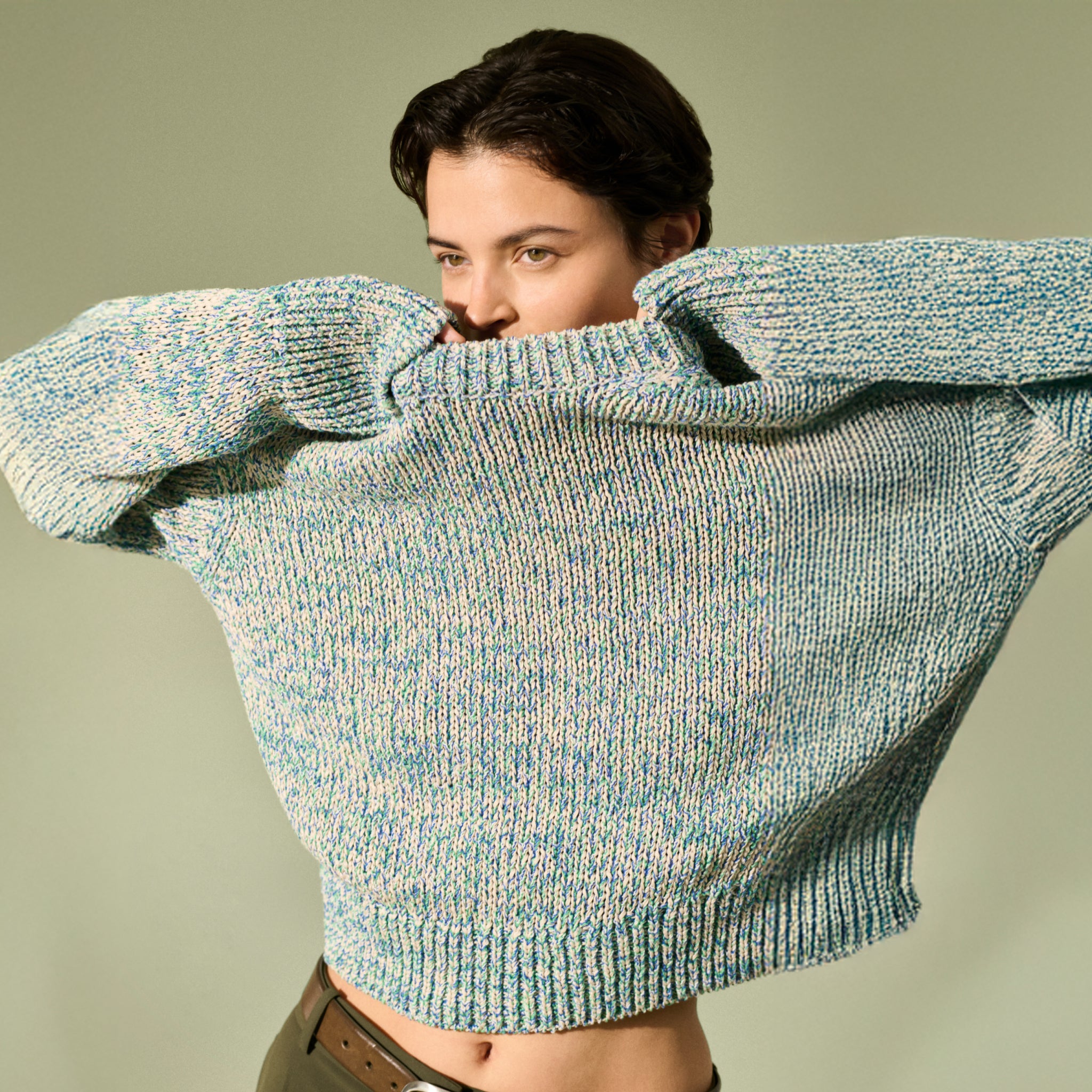 front image of a woman wearing the maura sweater in multi