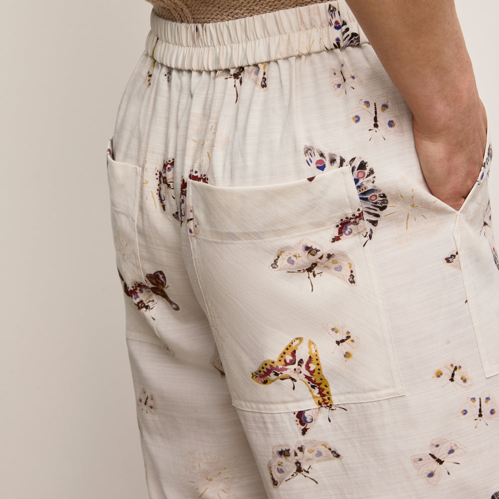 Front image of a woman wearing The Madelyn Pant - Airy Cotton :: Butterfly Print