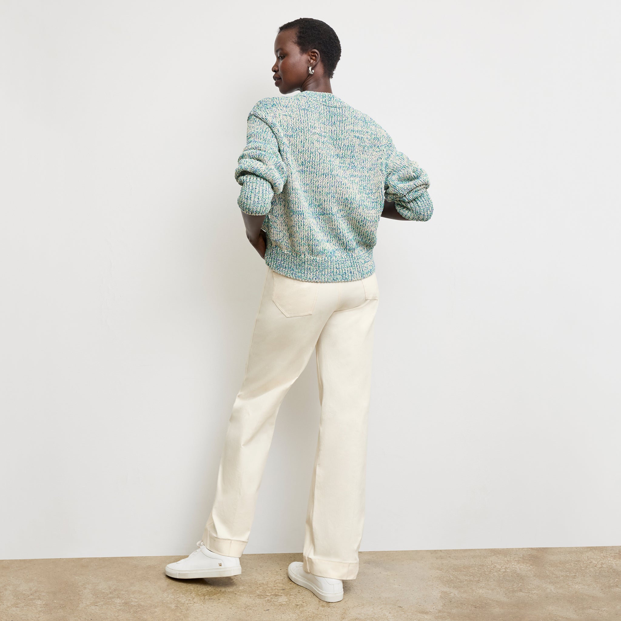 back image of a woman wearing the maura sweater in multi 