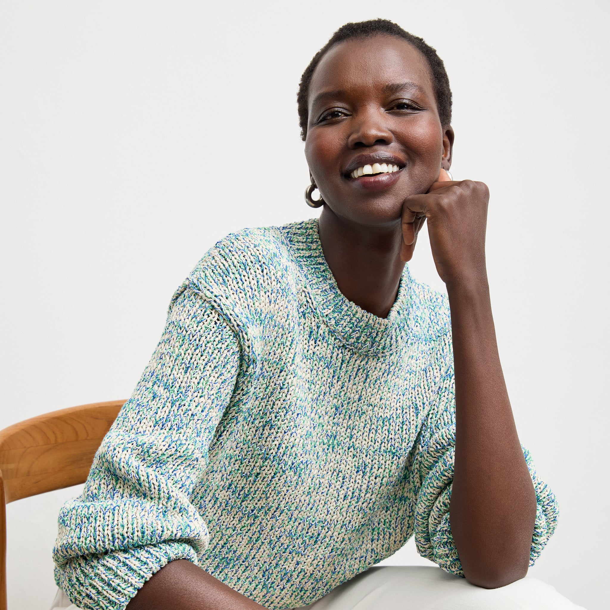 front image of a woman wearing the maura sweater in multi 