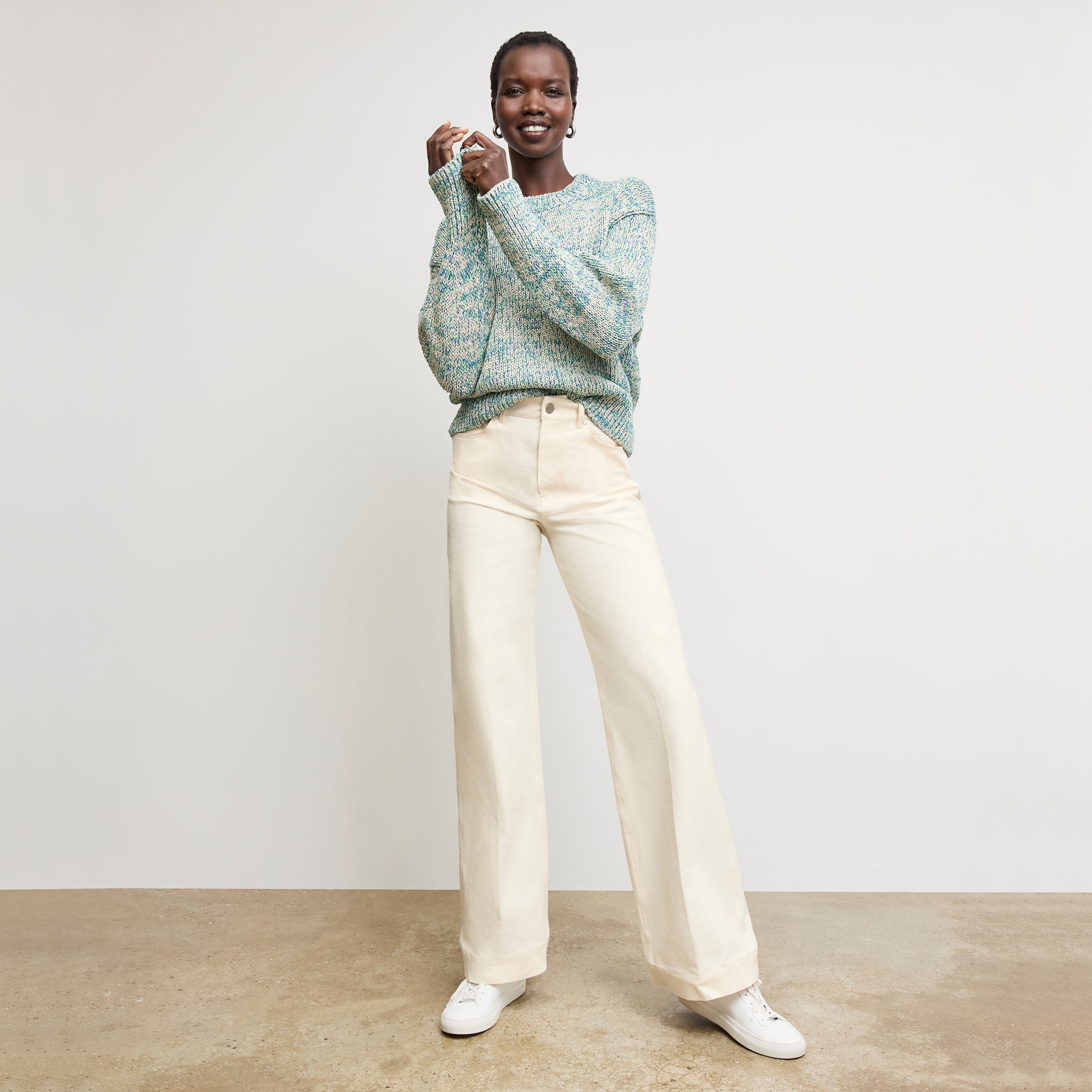 front image of a woman wearing the maura sweater in multi 