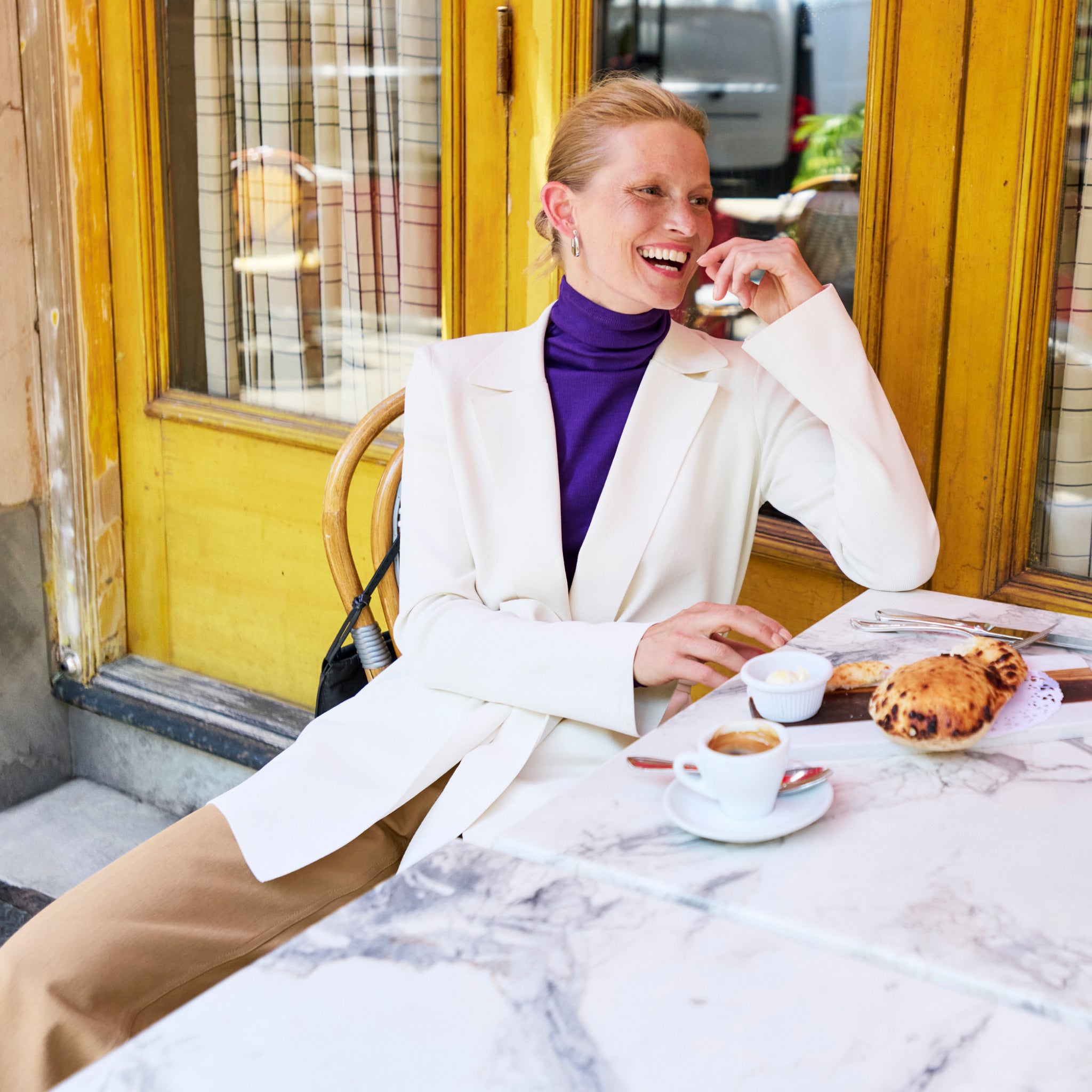 Front image of a woman wearing the Merritt Jardigan in Ivory 
