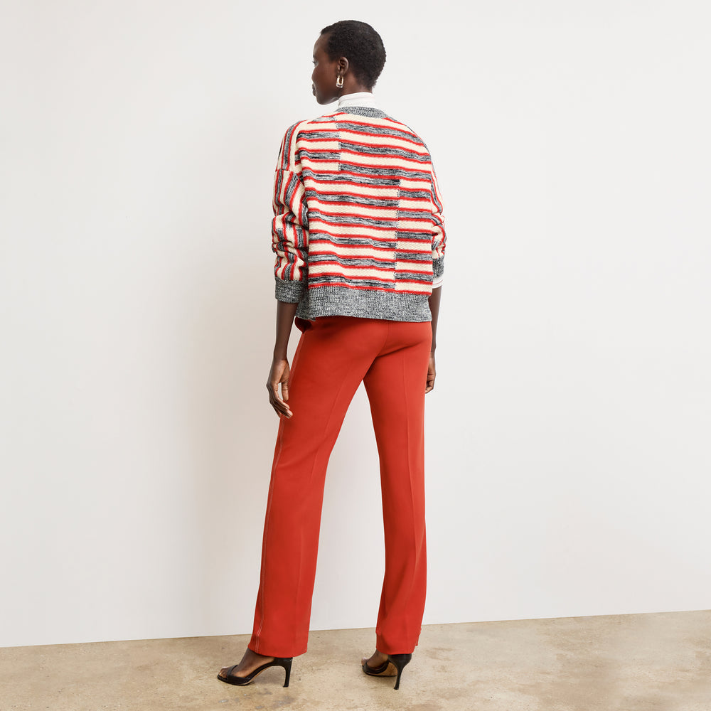 back image of a woman wearing the lowen pant in ginger with topstitch