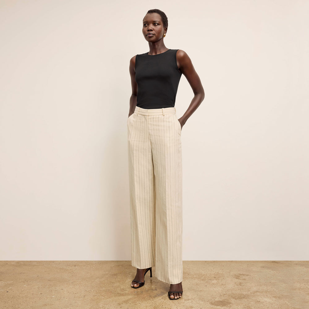 front image of a woman wearing the tinsley pant in linen stripe